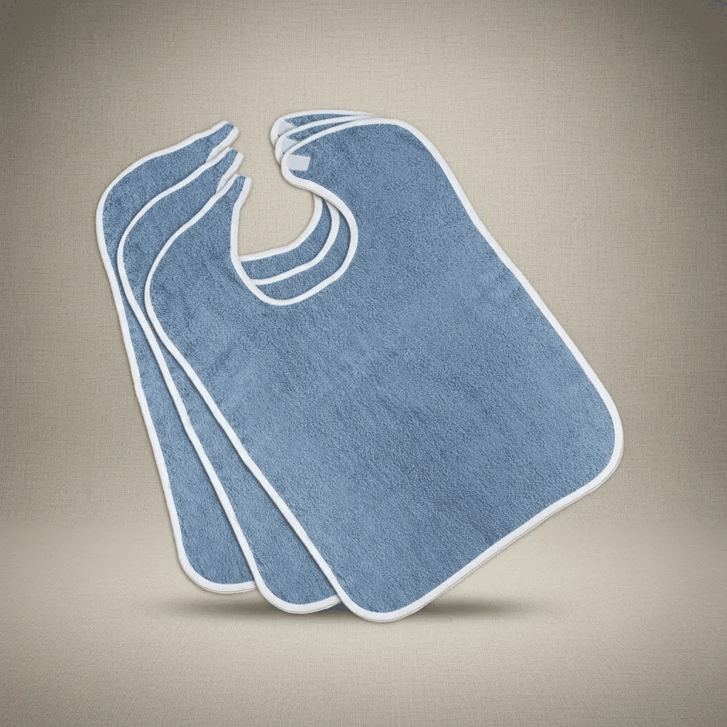 Three blue adult bibs with white trim stacked on a neutral background