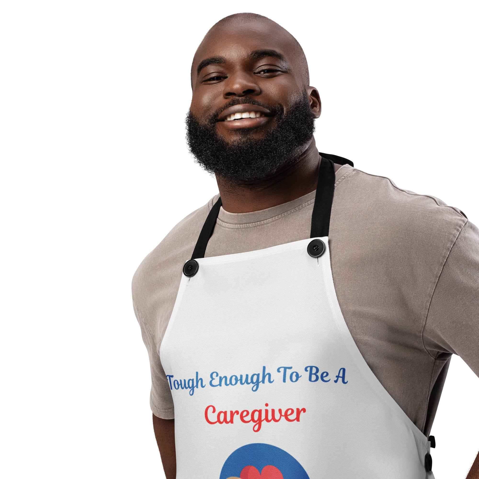 Man wearing a white Caregiver Alzheimer's Awareness apron with text Tough Enough To Be A Caregiver