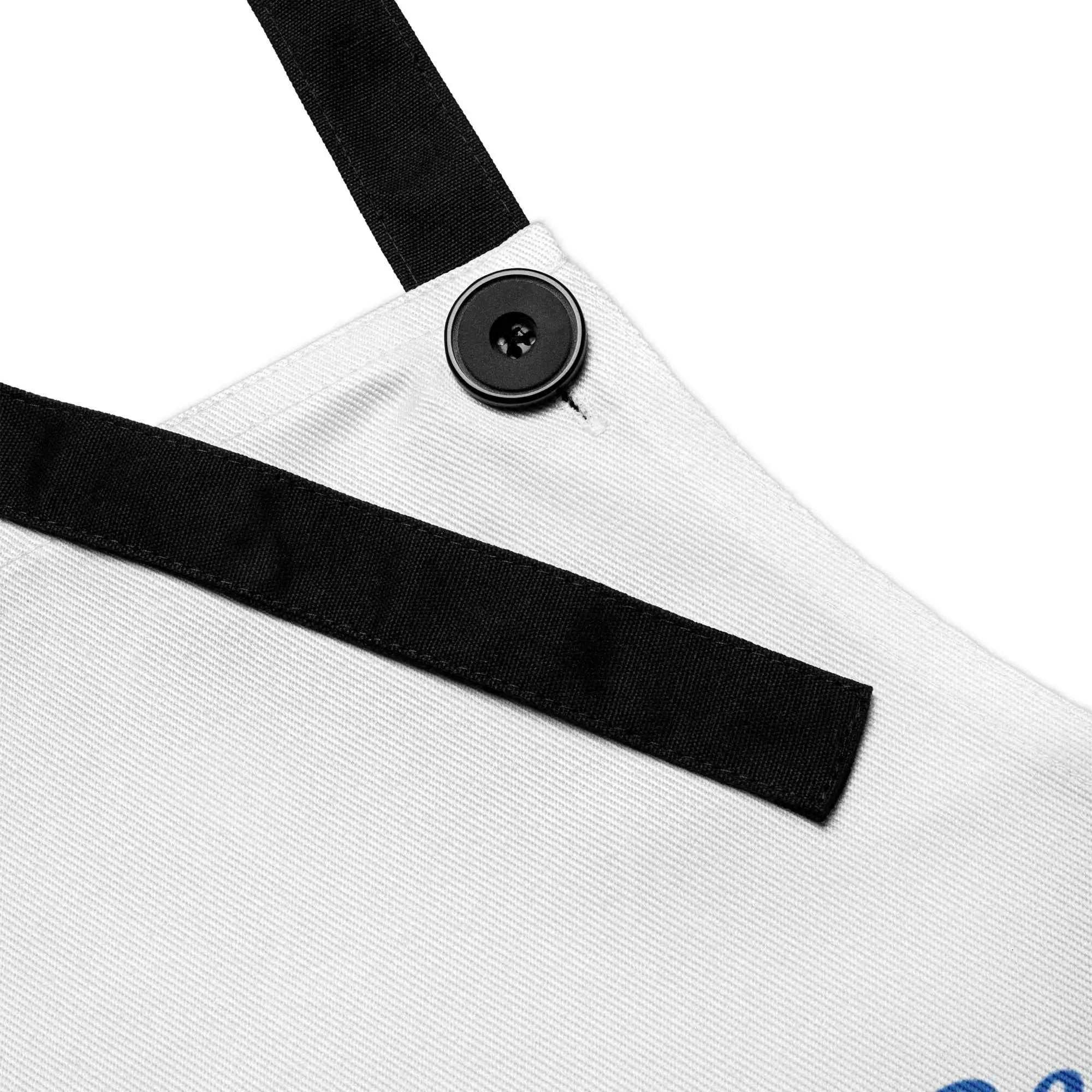 Close up of black strap and button on white Caregiver Apron Alzheimer's Awareness