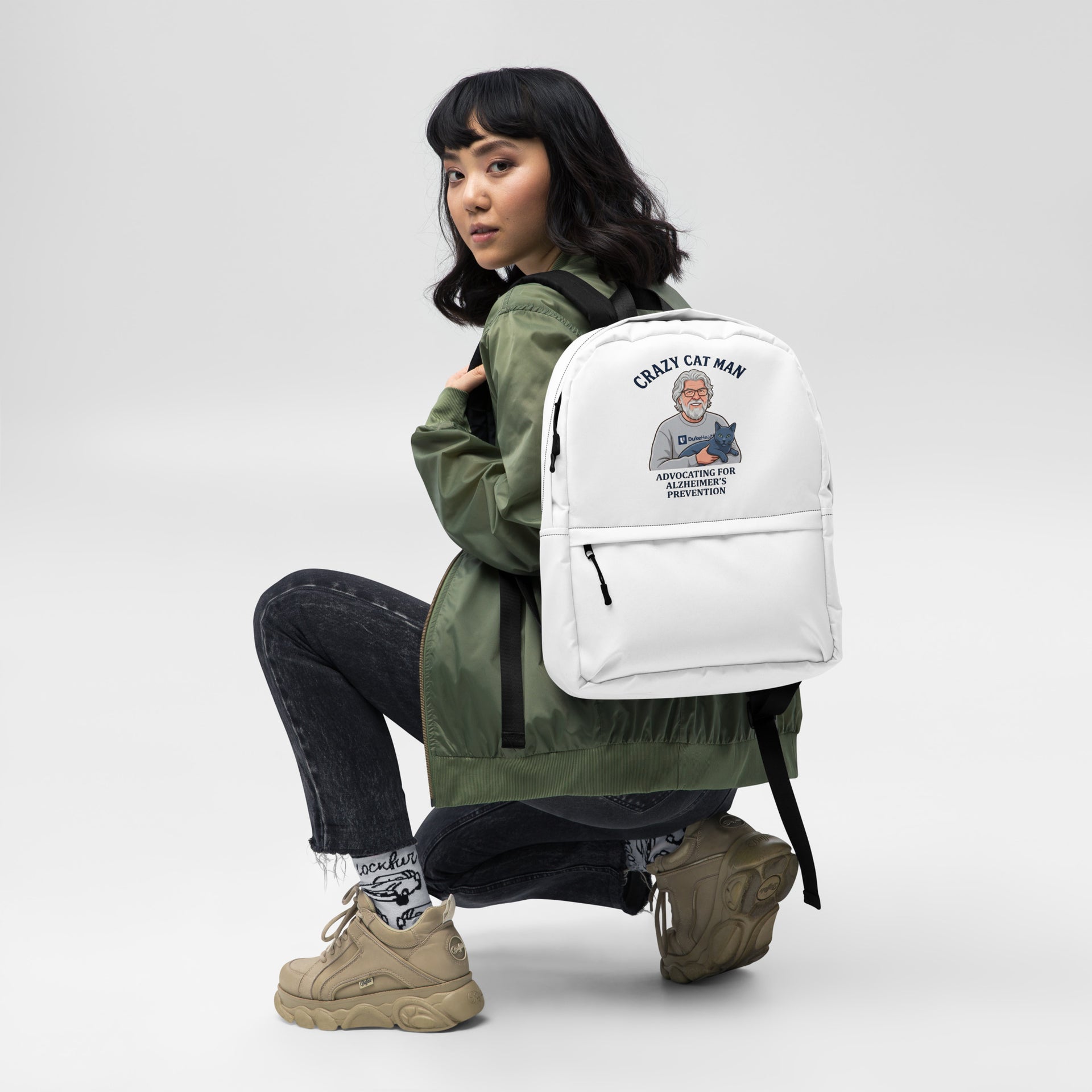Cat Man Signature Backpack | Support Alzheimer's Prevention with Style