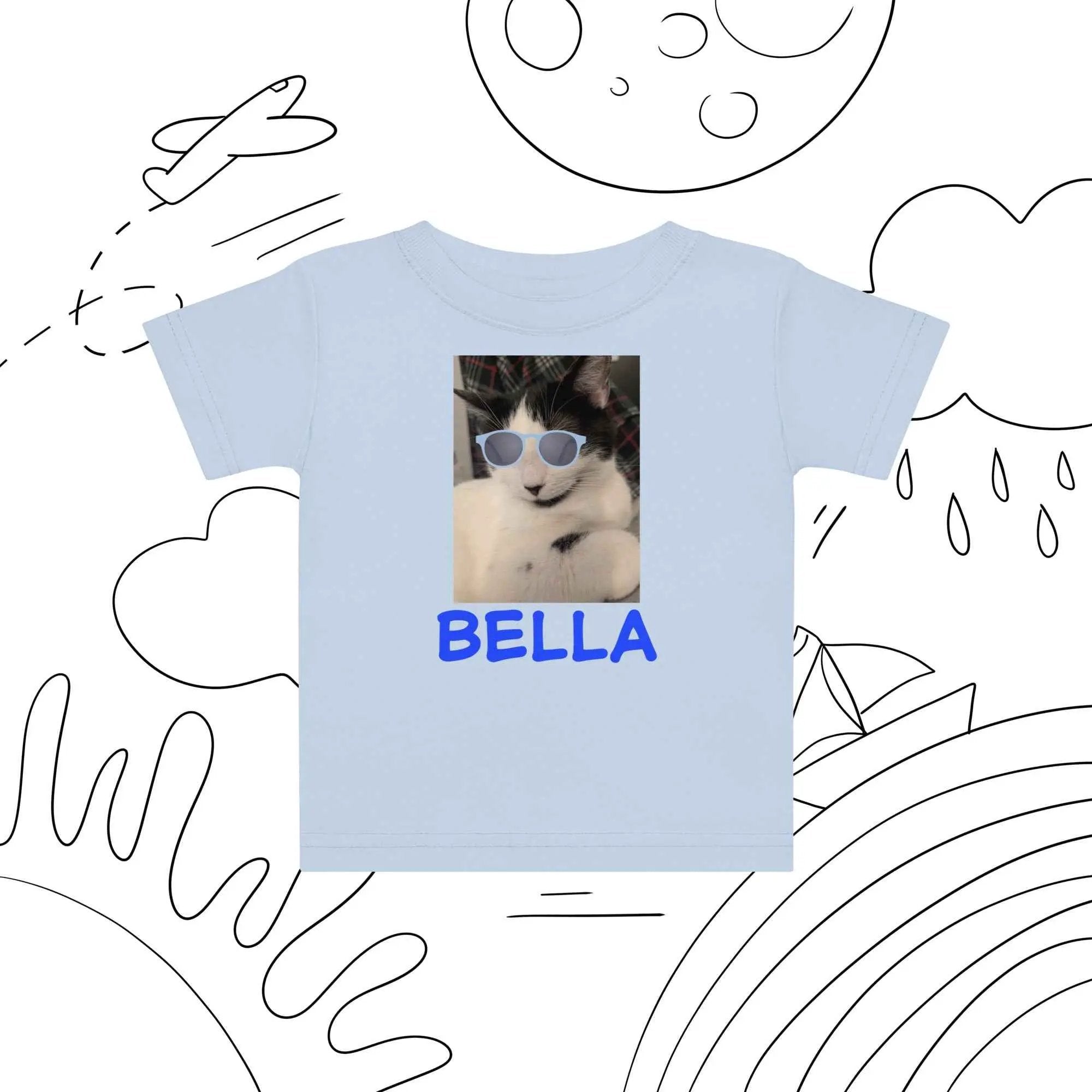 Light blue toddler T-shirt featuring a cute cat with blue sunglasses graphic, designed for young children.