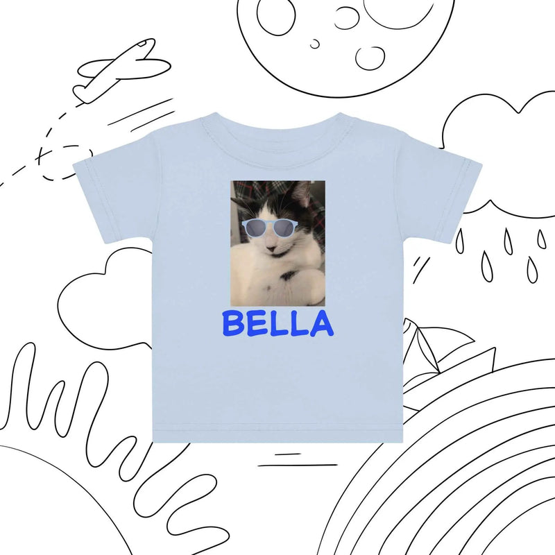 Light blue toddler T-shirt featuring a cute cat with blue sunglasses graphic, designed for young children.
