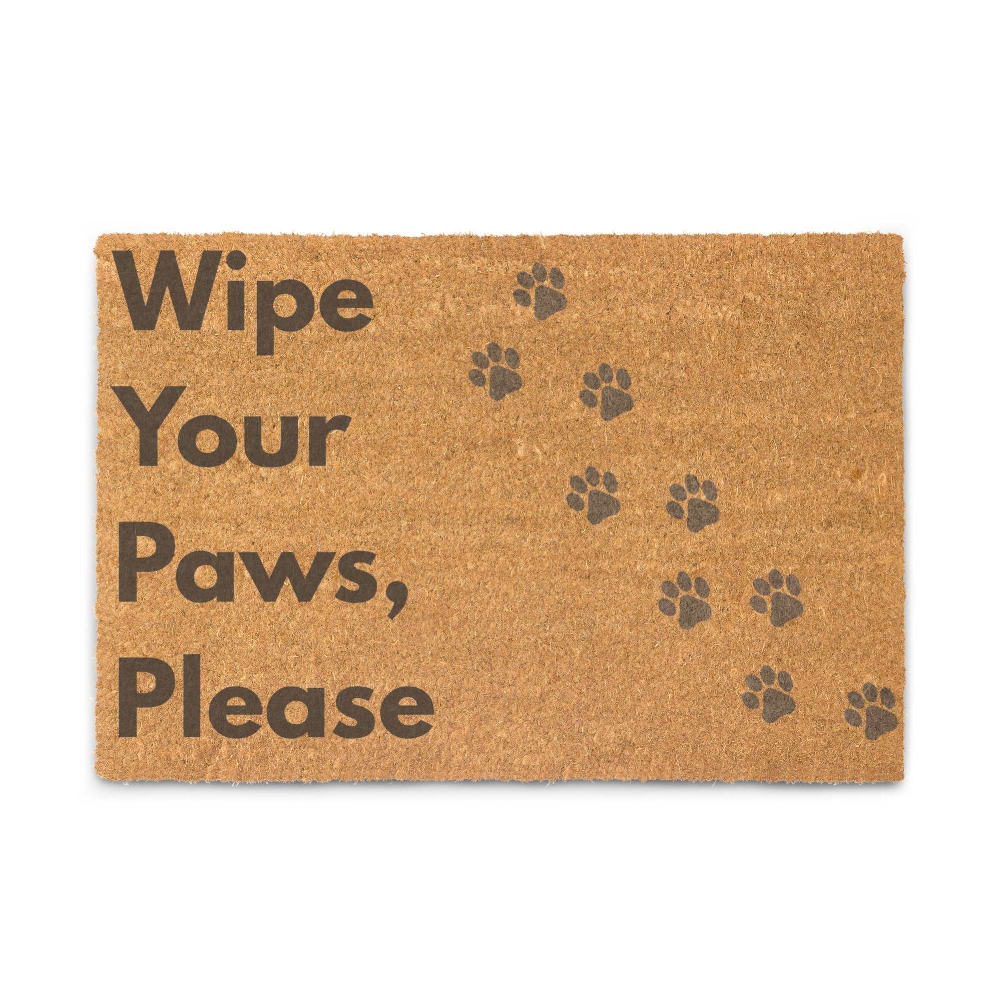 Coir doormat with "Wipe Your Paws Please" dog paw design, durable coconut fiber, black vinyl backing, ideal for covered outdoor use