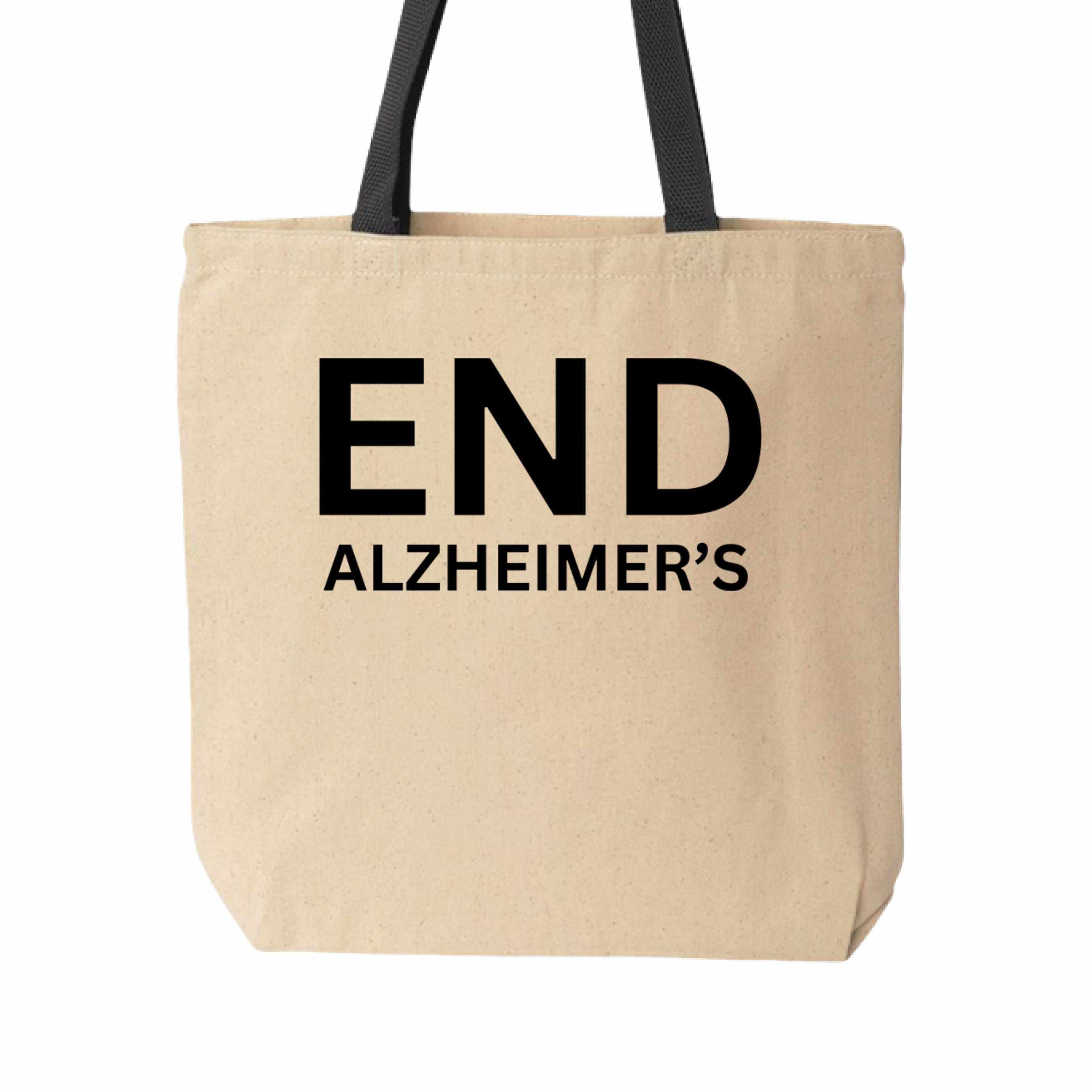 Cotton canvas tote bag with black text reading END ALZHEIMER'S