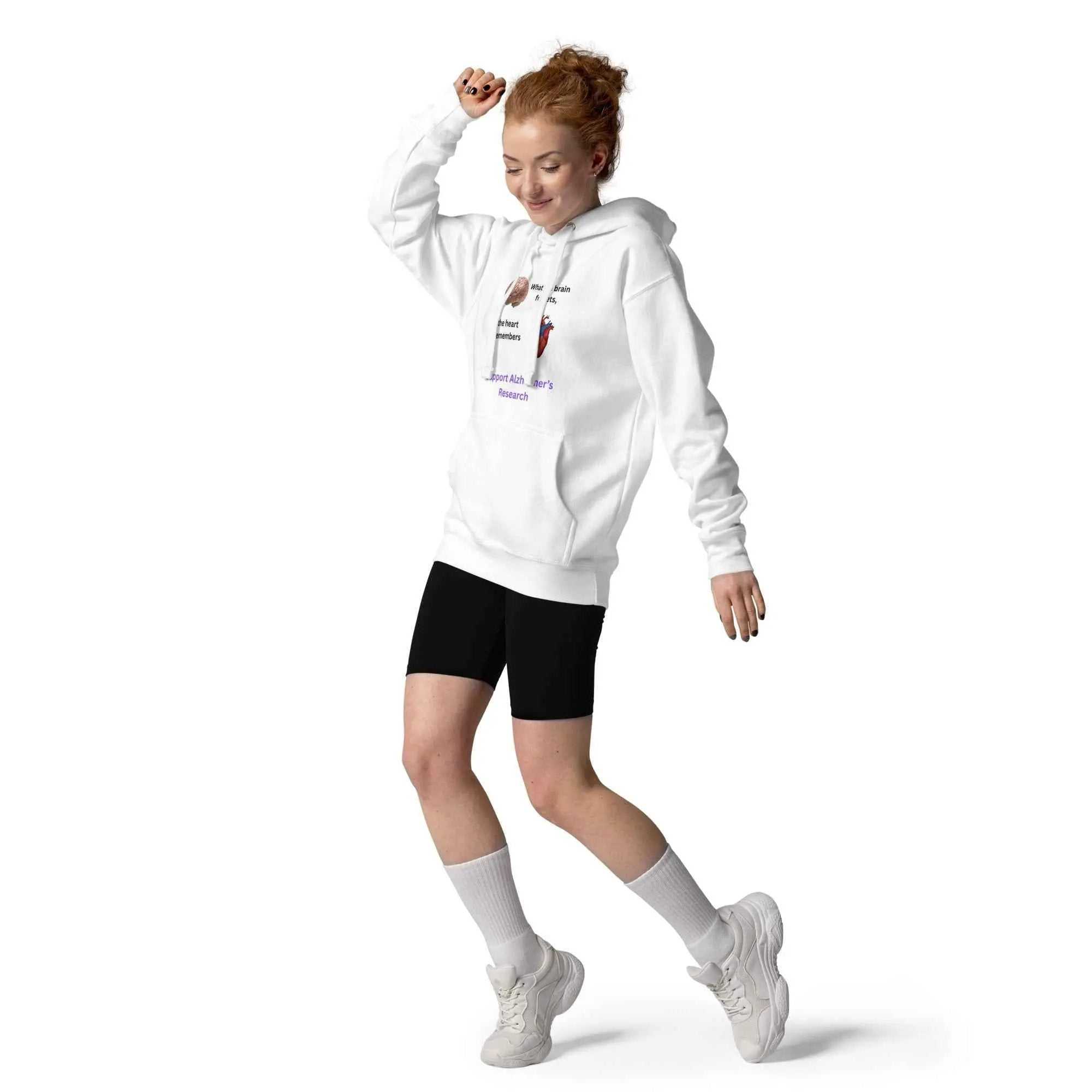 Unisex white cotton hoodie featuring a heart and brain graphic, inspired by "When the Brain Forgets, the Heart Remembers" design.