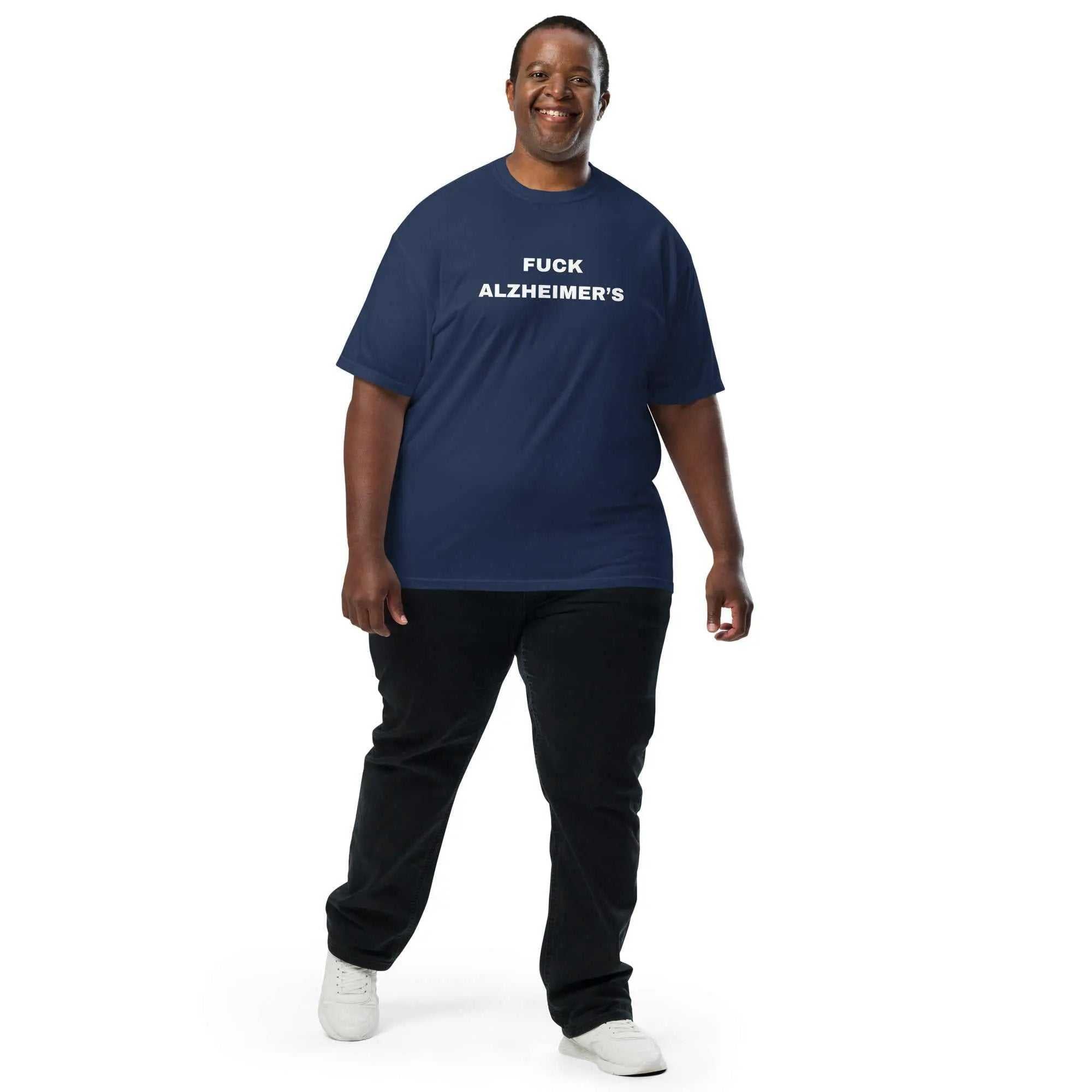 Person wearing a navy blue Fuck Alzheimers unisex garment dyed heavyweight tee with white text