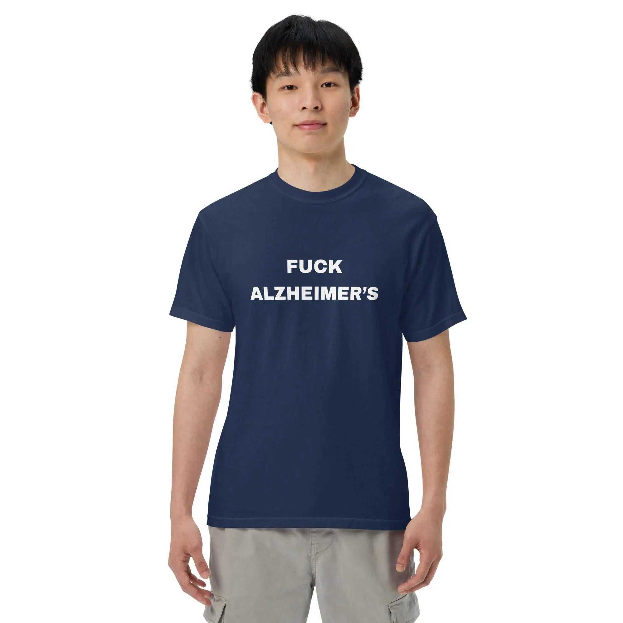 Man wearing a navy blue Fuck Alzheimer's unisex garment-dyed heavyweight t-shirt