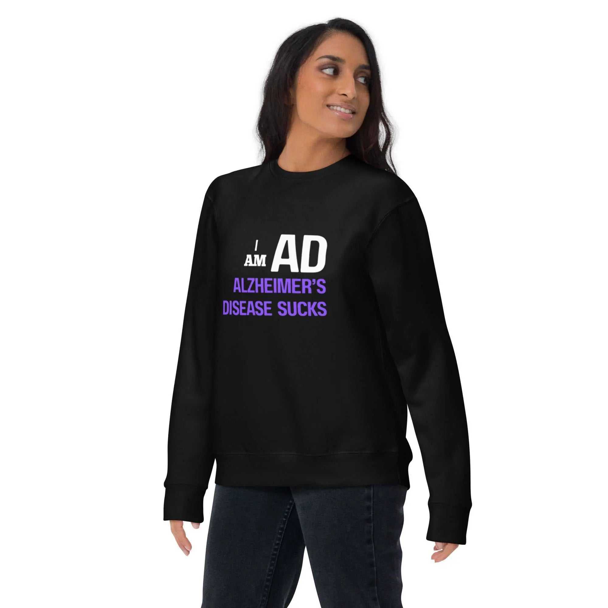 Person wearing black I AM AD sweatshirt with white and purple text