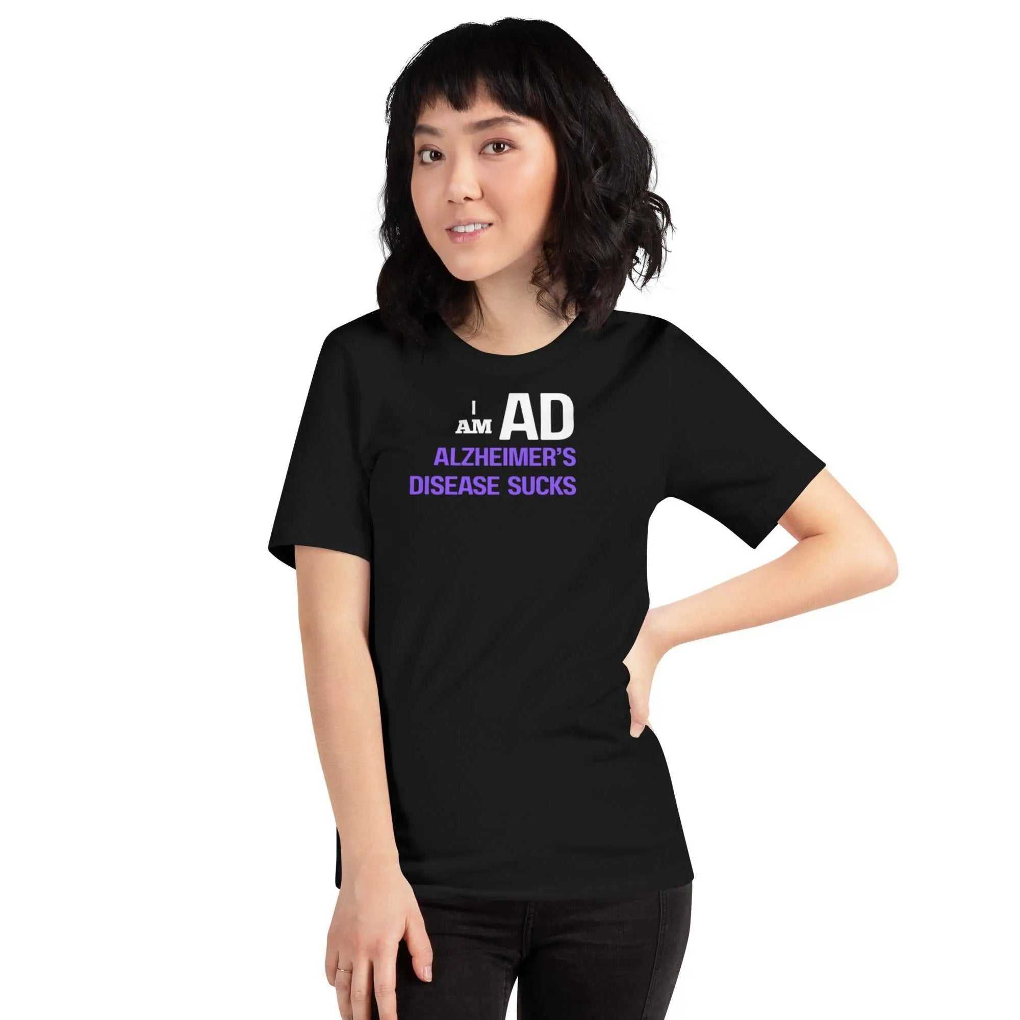Person wearing black I AM AD unisex t-shirt with white and purple text