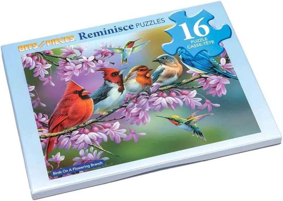 Large piece puzzle box featuring birds on a flowering branch