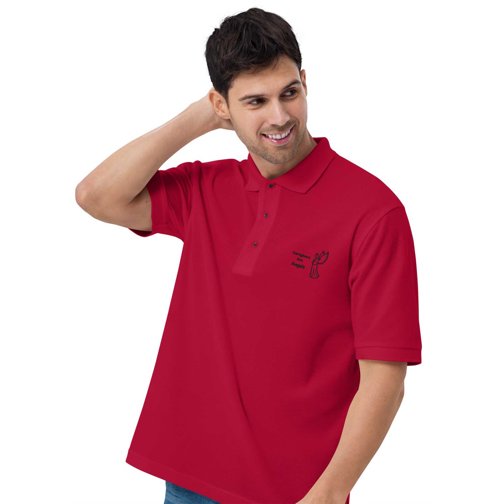 Man wearing red premium caregiver polo with black angel graphic and text on chest