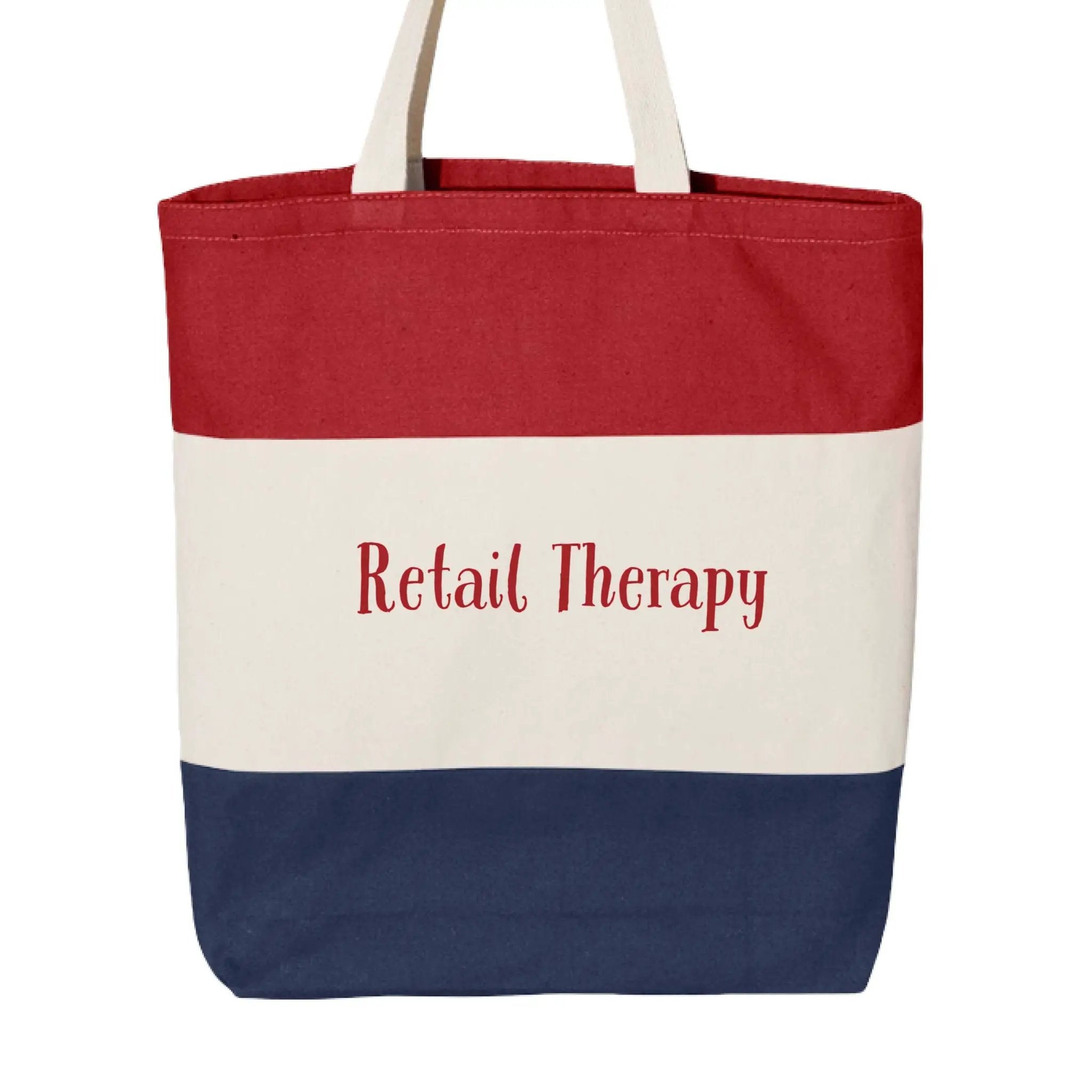 Tri-color tote bag by Greg's AZ Store featuring navy, natural, and red panels, perfect for stylish everyday retail therapy.