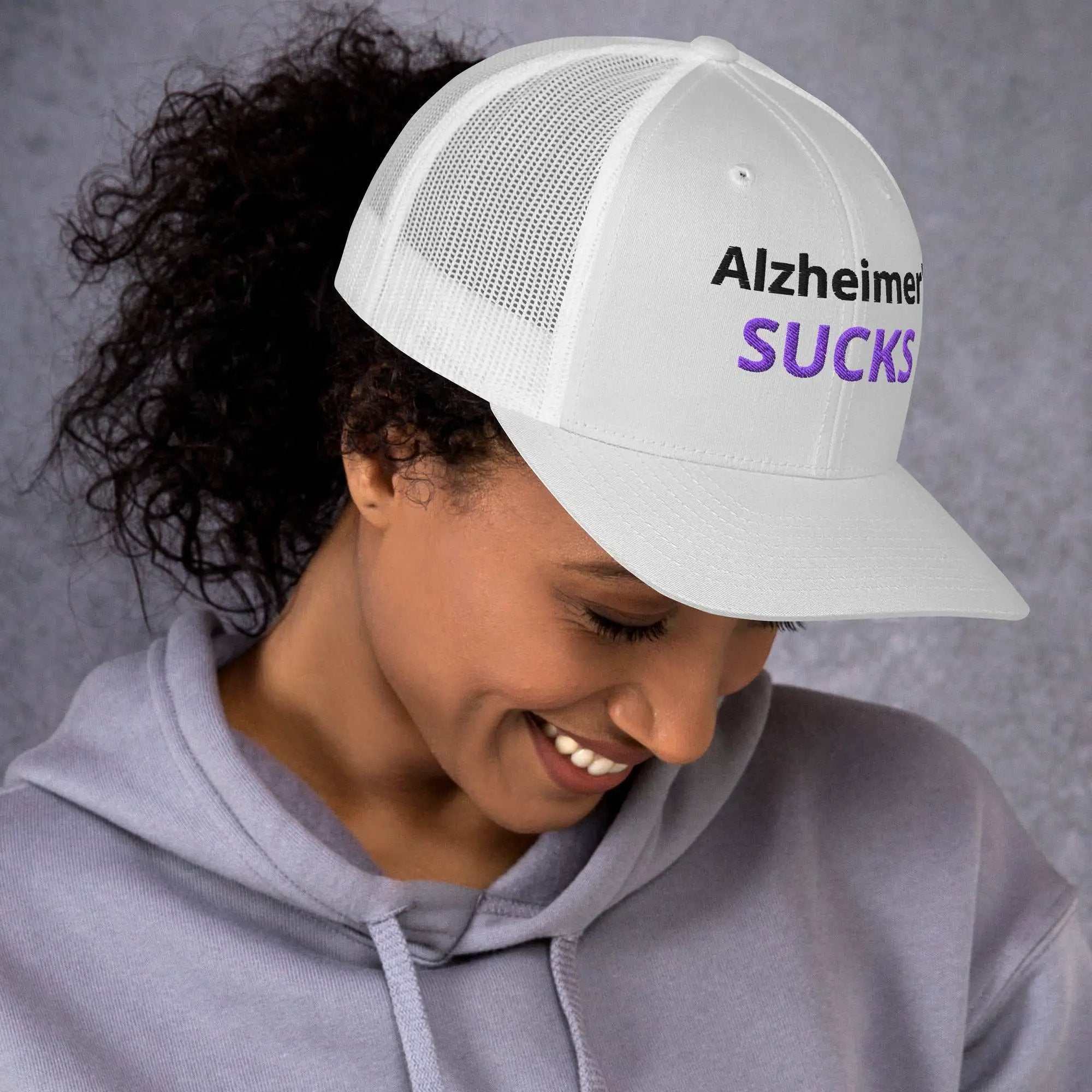 White embroidered Alzheimer's support trucker cap with front logo and mesh back, casual style, by Greg's AZ Store.