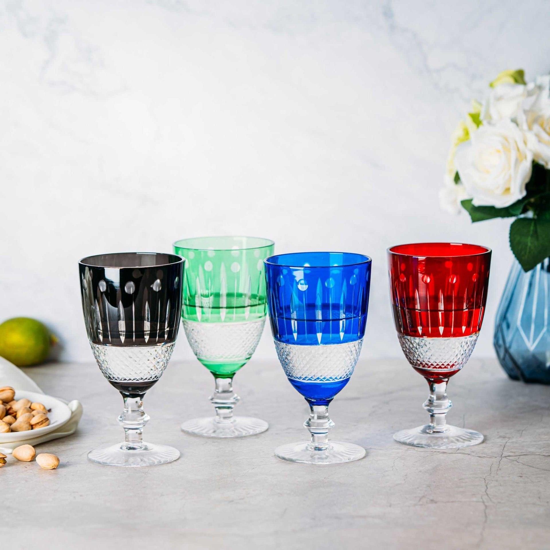 Set of 4 handblown and hand-cut multicolor crystal short chalice glasses for elegant drinks