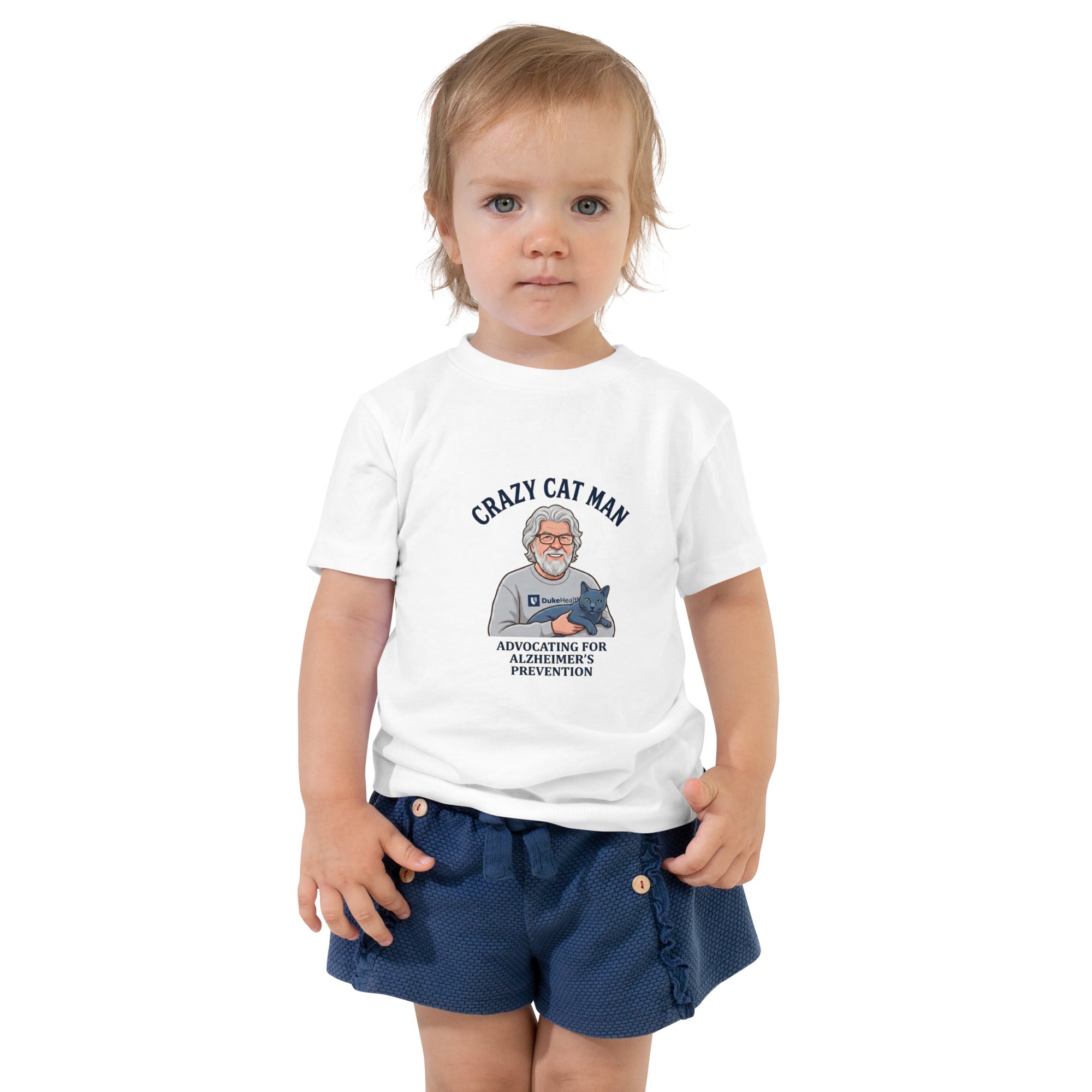 Toddler wearing white tee shirt with Crazy Cat Man Alzheimer prevention graphic