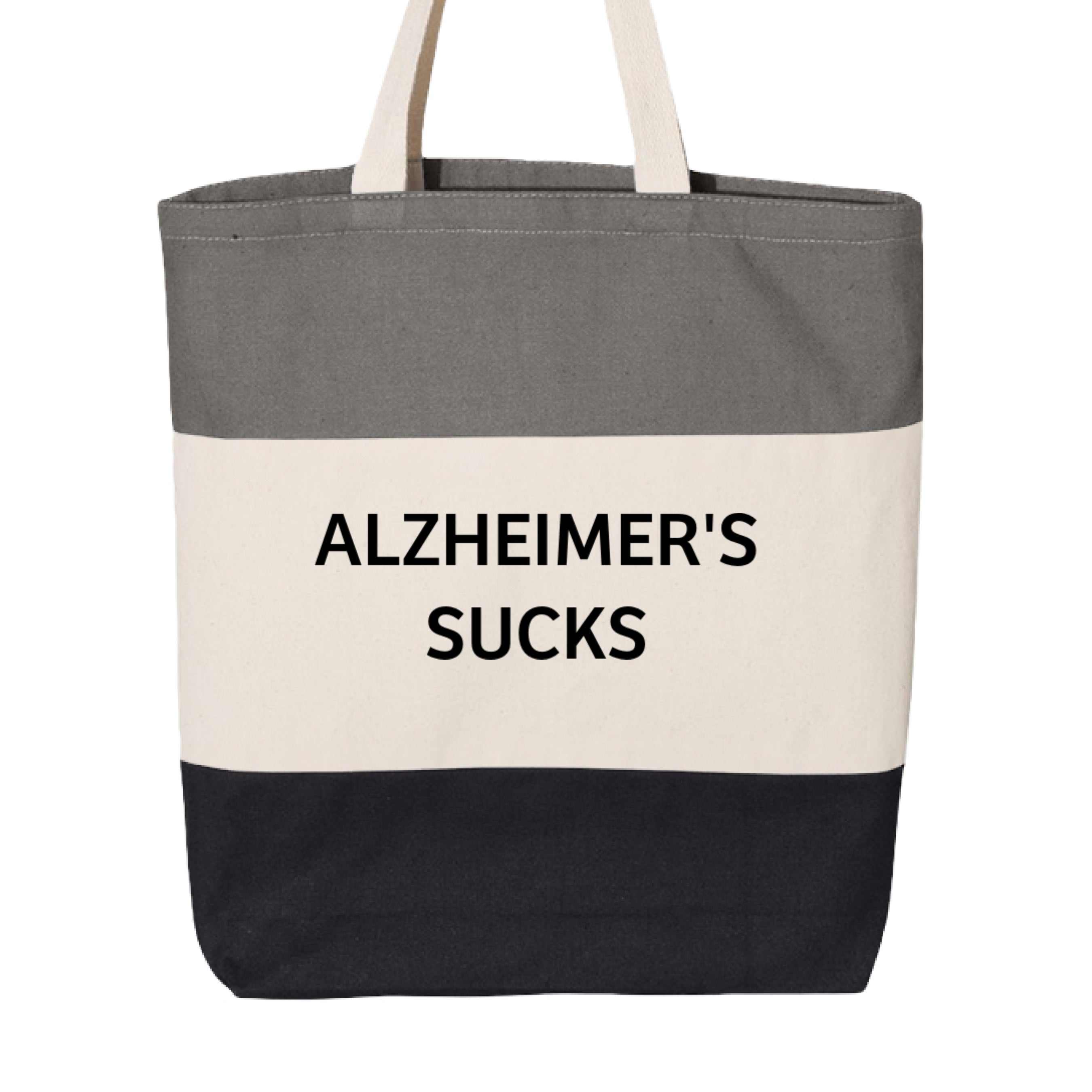 Tri-color tote bag with grey white and black horizontal stripes and Alzheimer's Sucks text