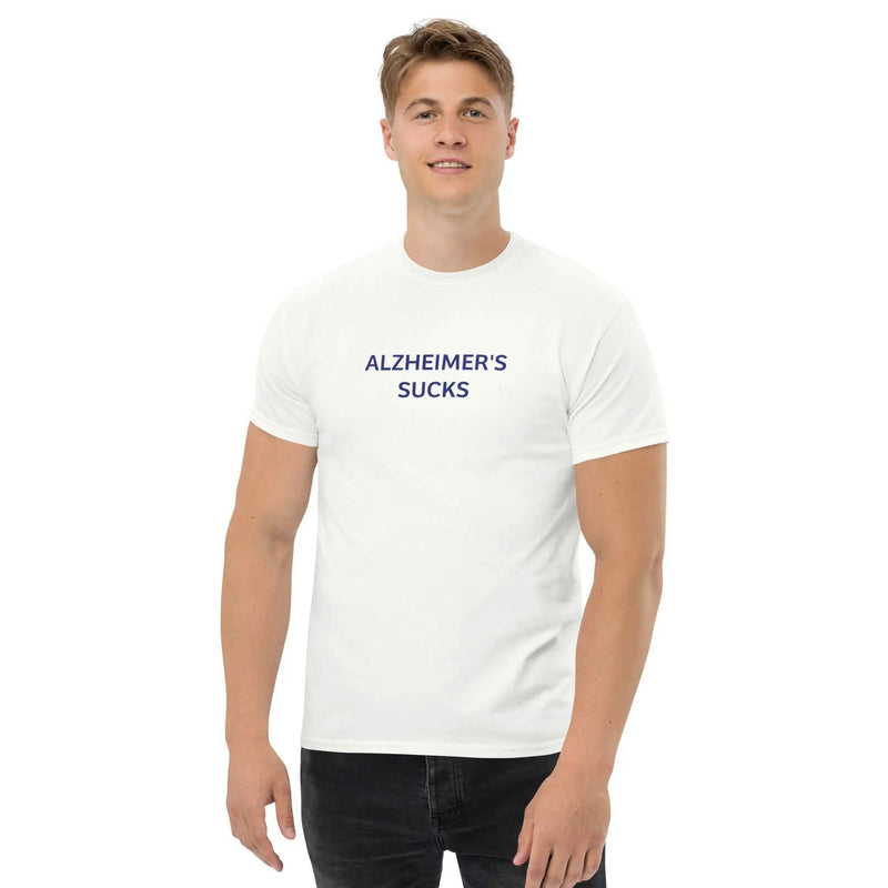 Unisex white Alzheimer's Sucks T-shirt from Greg's AZ Store with bold printed text on front.