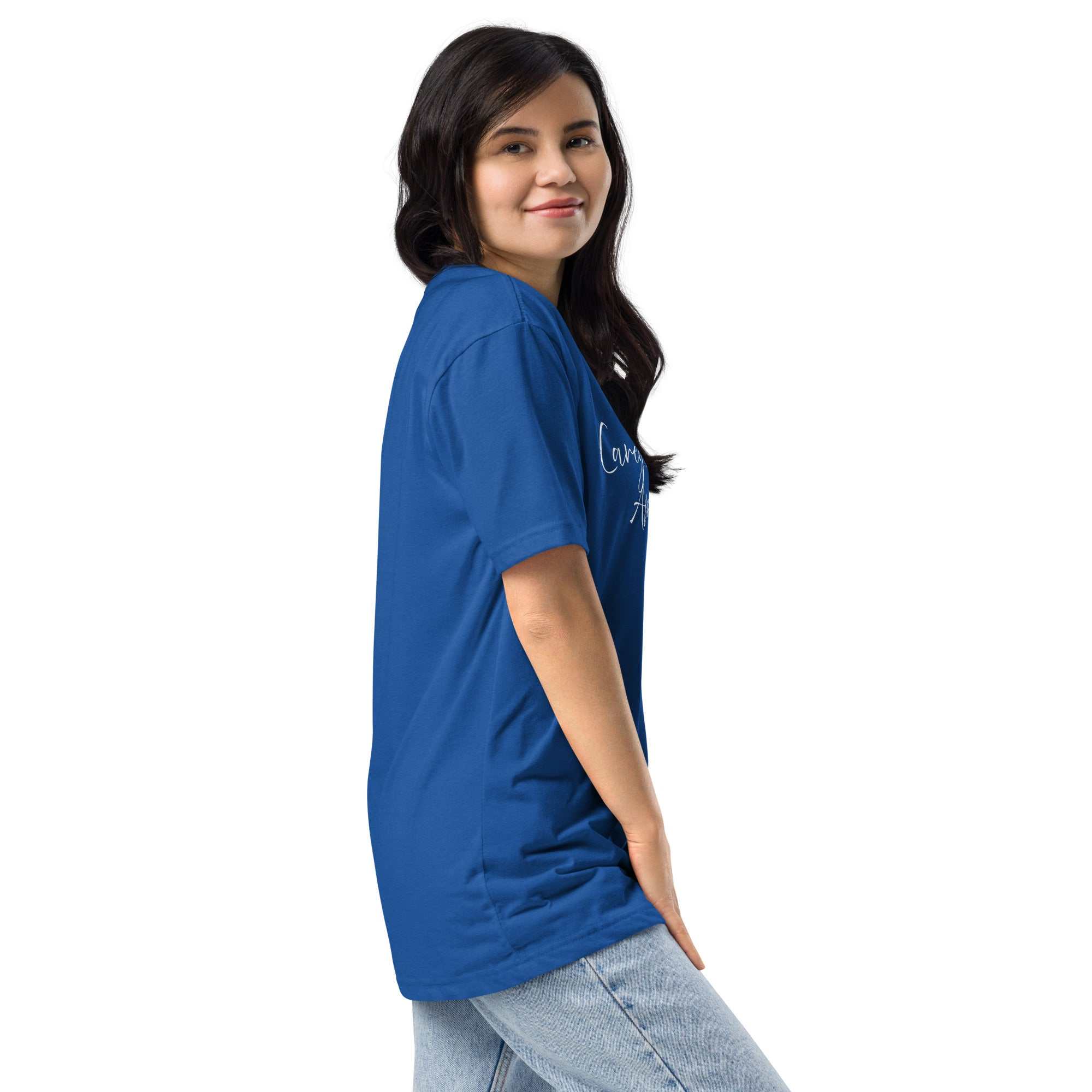 Person wearing a blue unisex fitted t-shirt with Caregivers Are Awesome white graphic