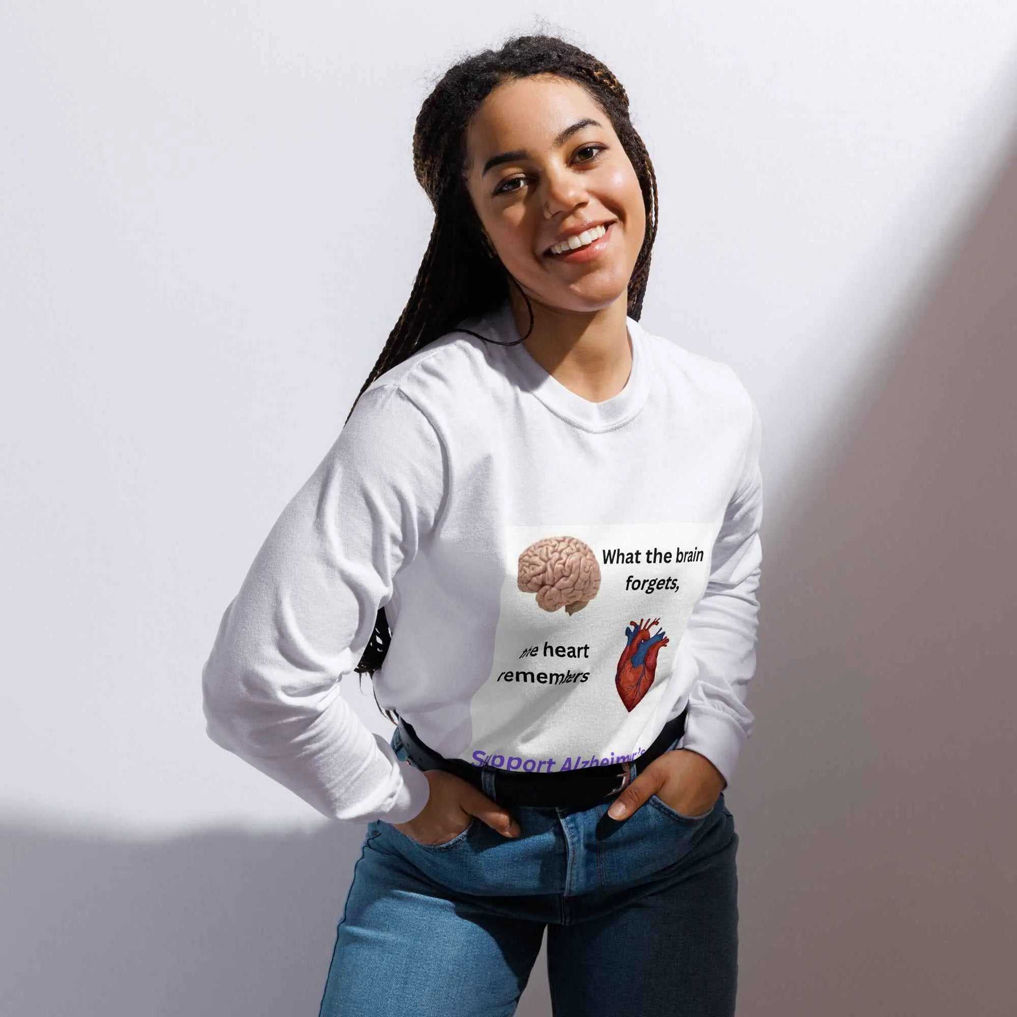 Woman wearing When the Brain Forgets the Heart Remembers long-sleeve shirt with brain and heart graphic