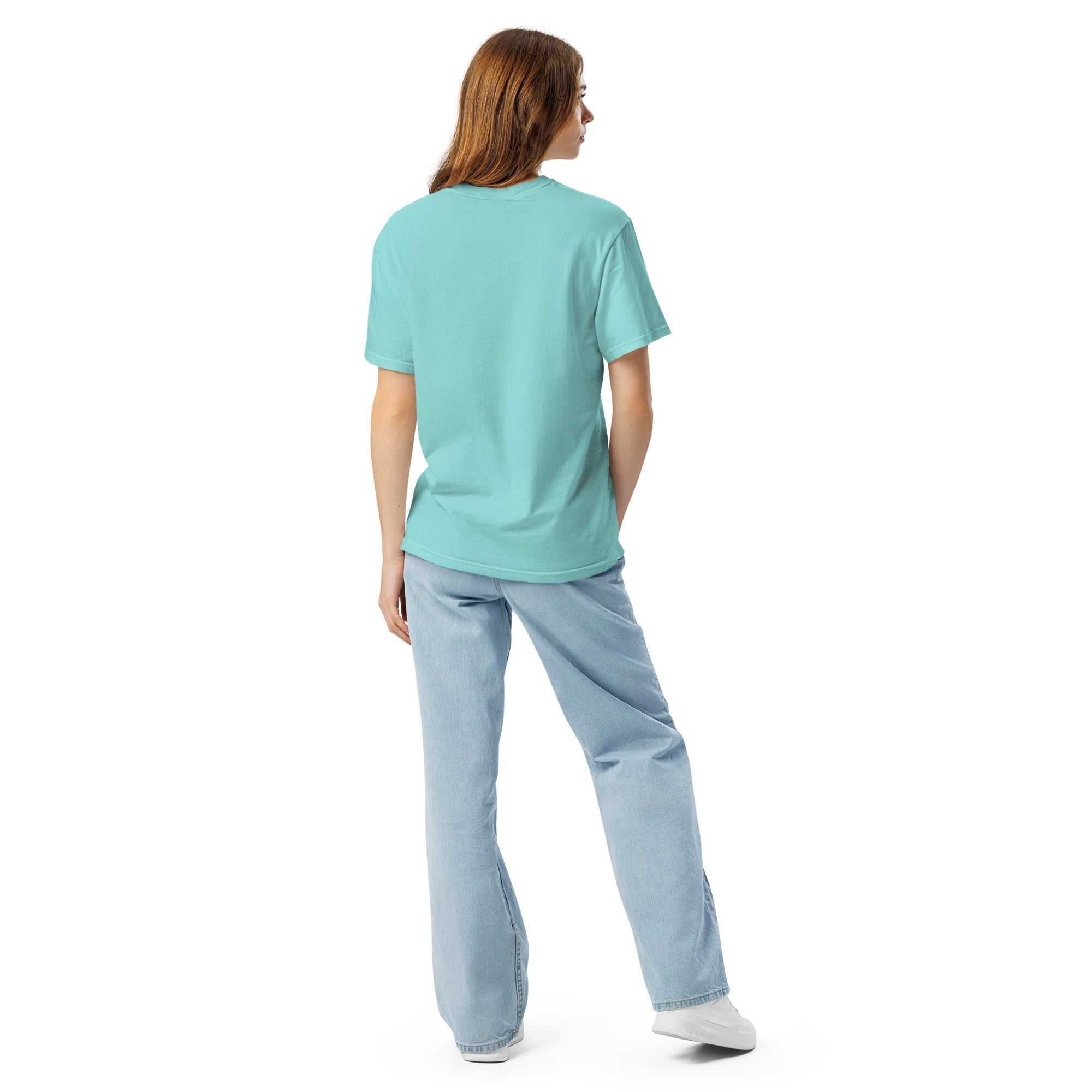 Back view of a person wearing a light blue heavyweight t-shirt and light blue jeans