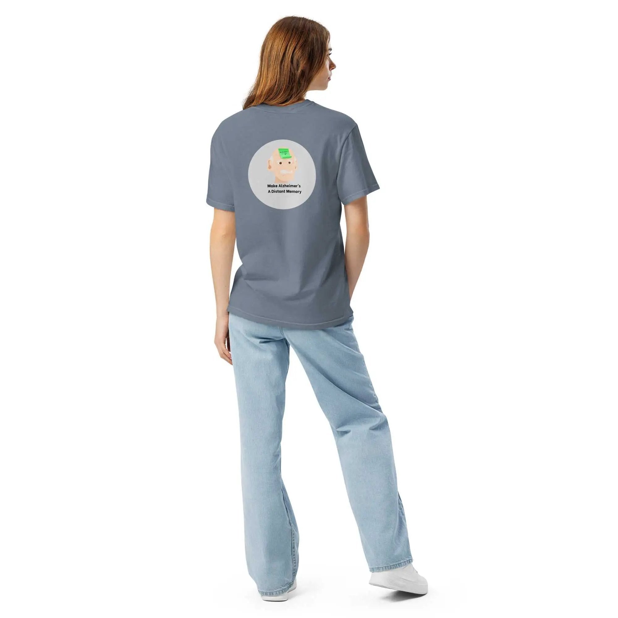 Person wearing blue Alzheimer's T-shirt with Make Alzheimer's A Distant Memory graphic on back