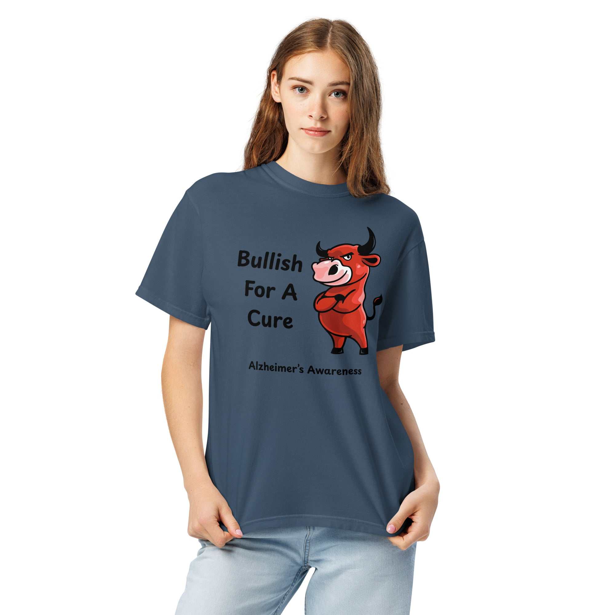 Unisex heavyweight t-shirt in navy blue featuring a red bull graphic and Bullish For A Cure Alzheimer's Awareness text