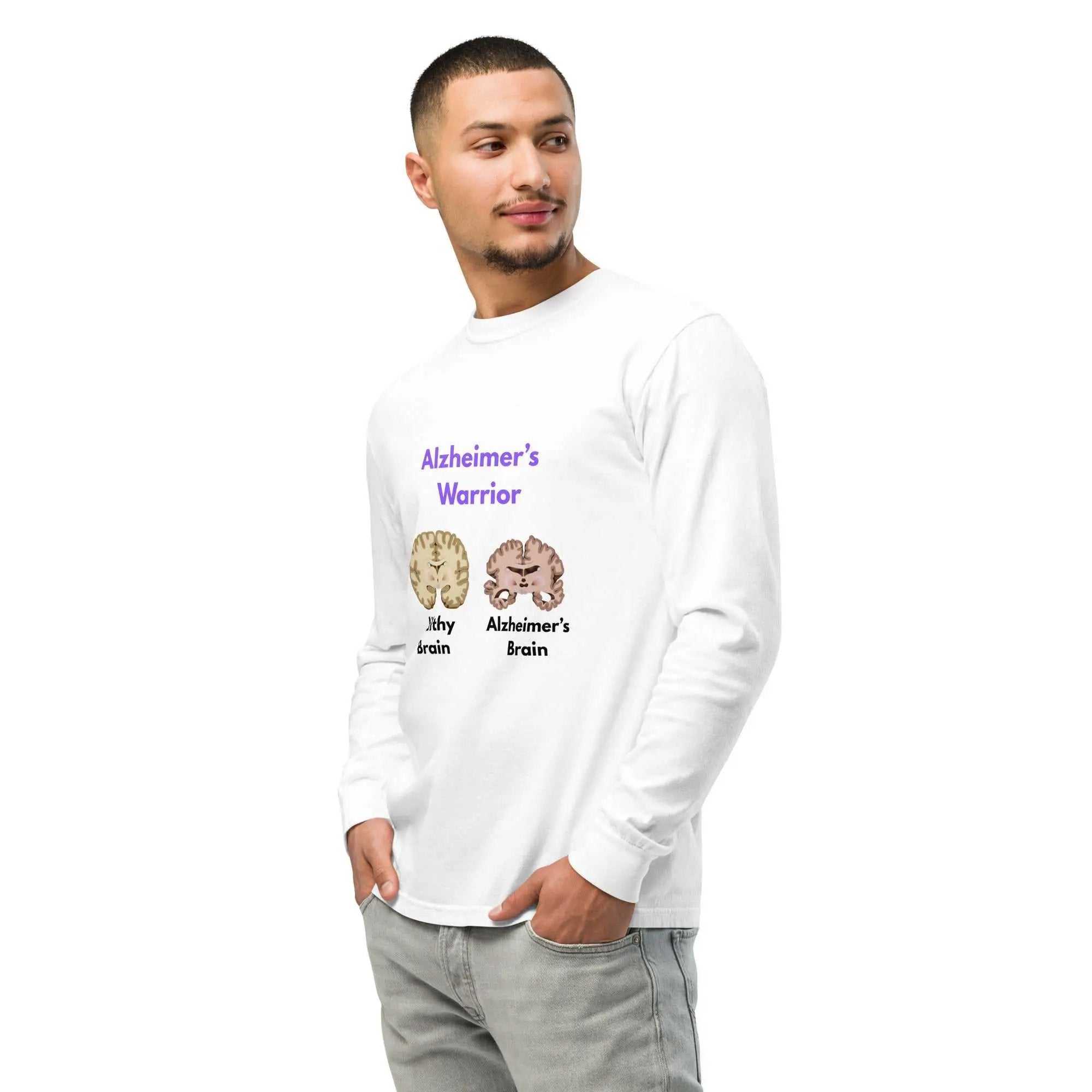 Man wearing white long sleeve shirt with Alzheimer's Warrior graphic showing healthy and Alzheimer's brain comparison