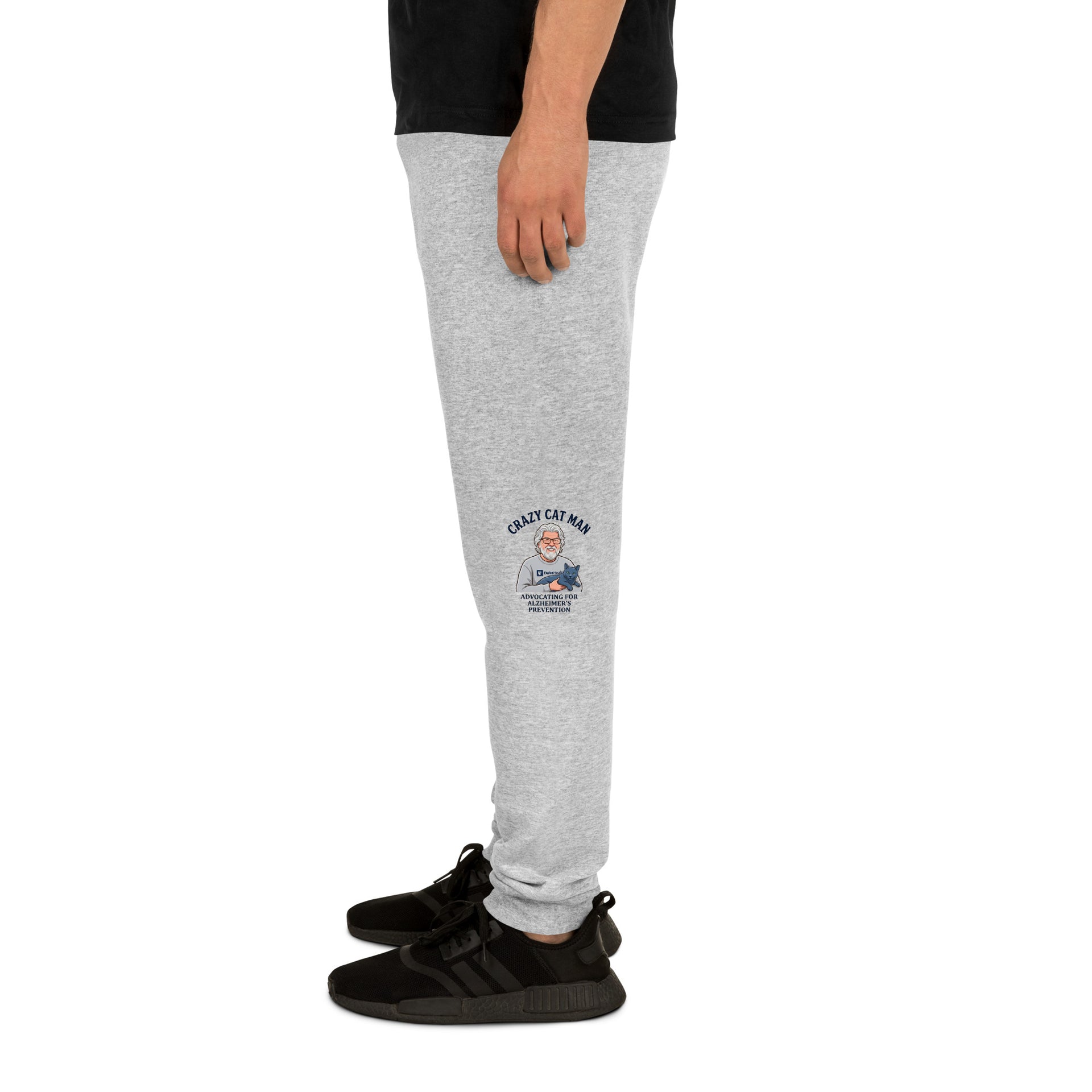 Grey unisex joggers for Alzheimers prevention with Cat Man signature logo on the leg