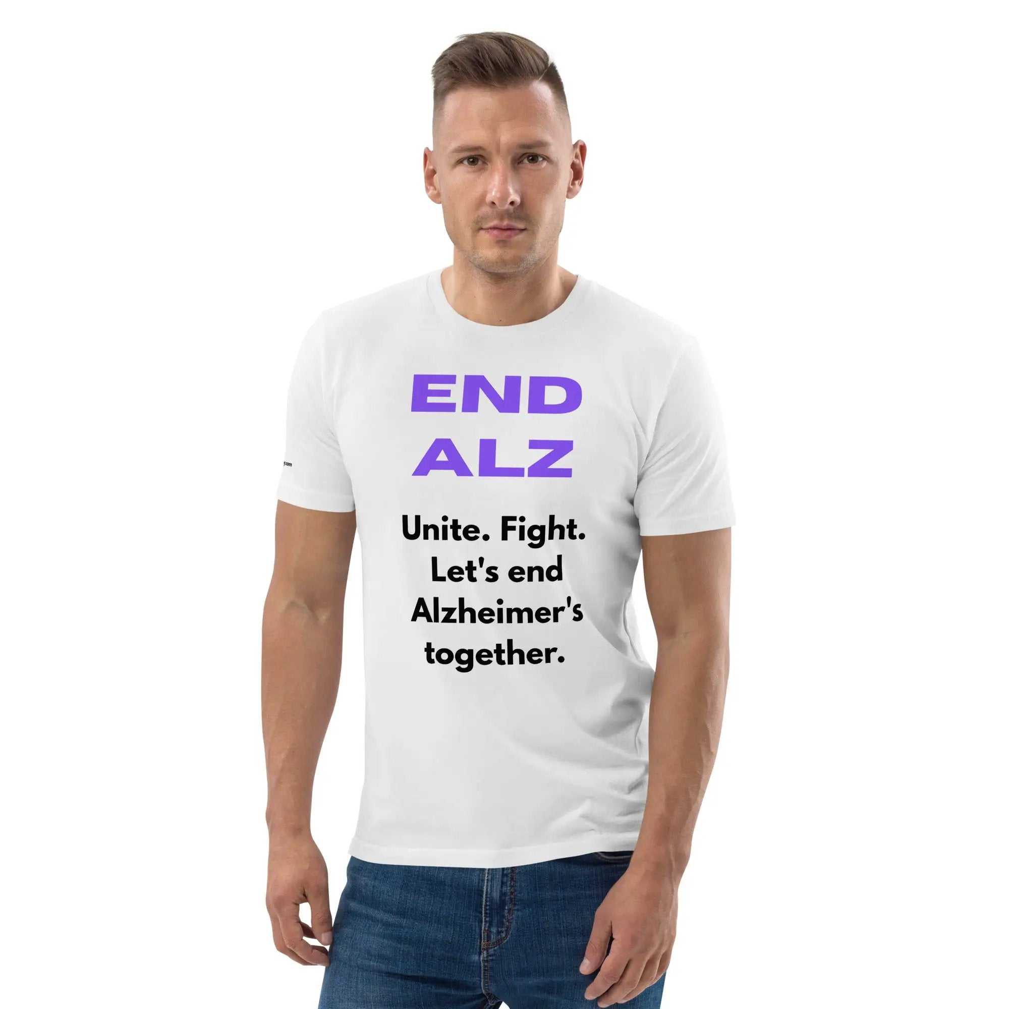 Man wearing white END ALZ unisex t-shirt with purple and black text