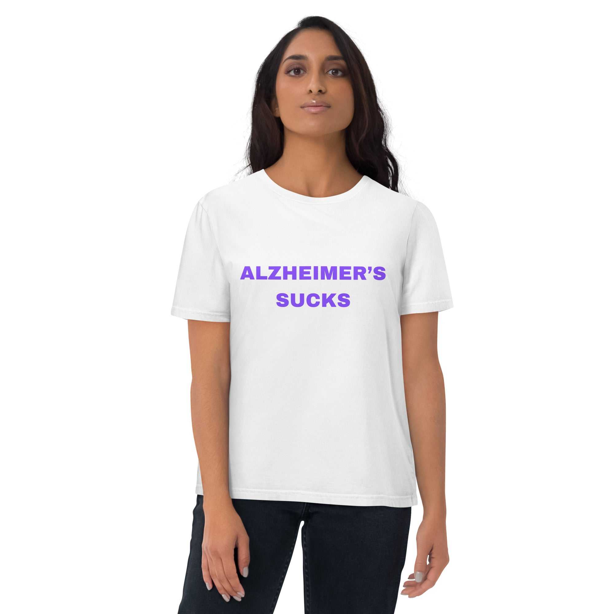 Person wearing a white Alzheimer's Sucks unisex organic cotton t-shirt with purple text