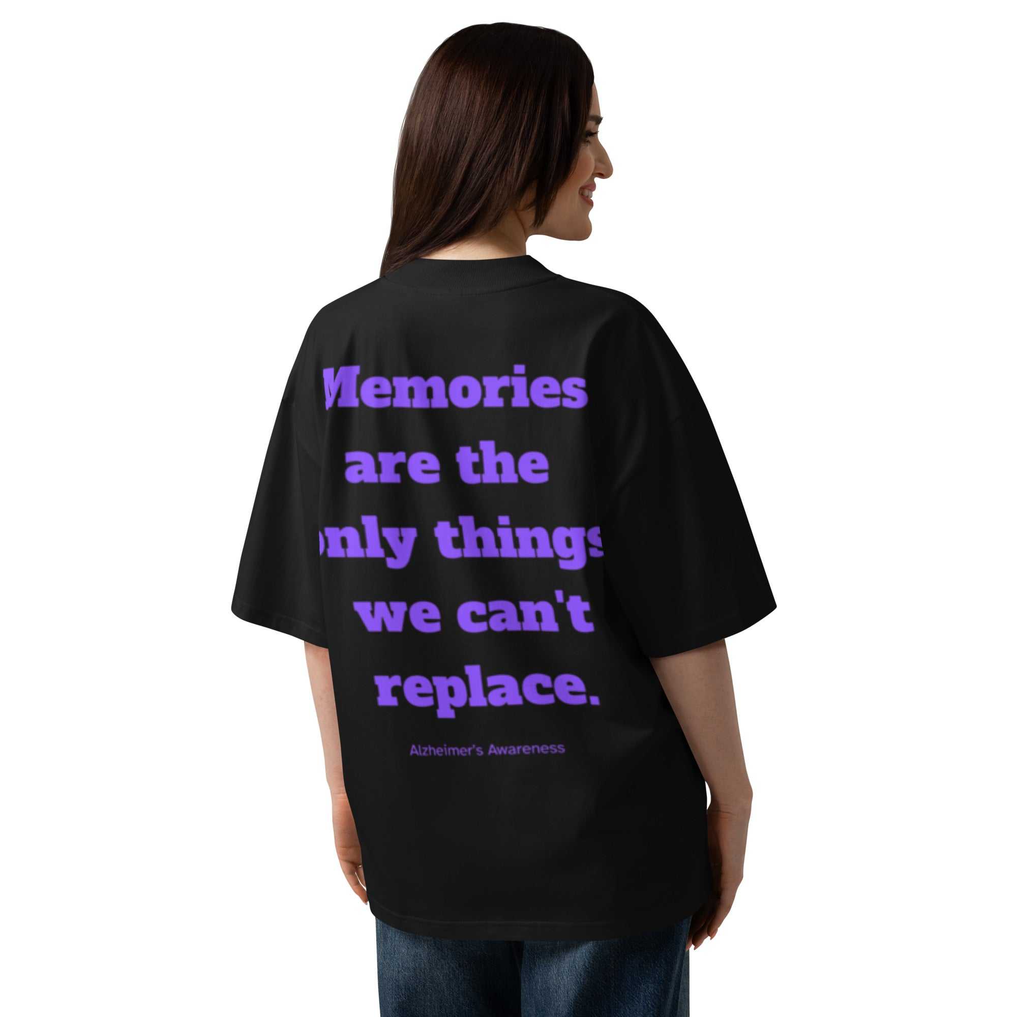 Back view of black unisex organic oversized t-shirt with purple Alzheimer's awareness graphic text