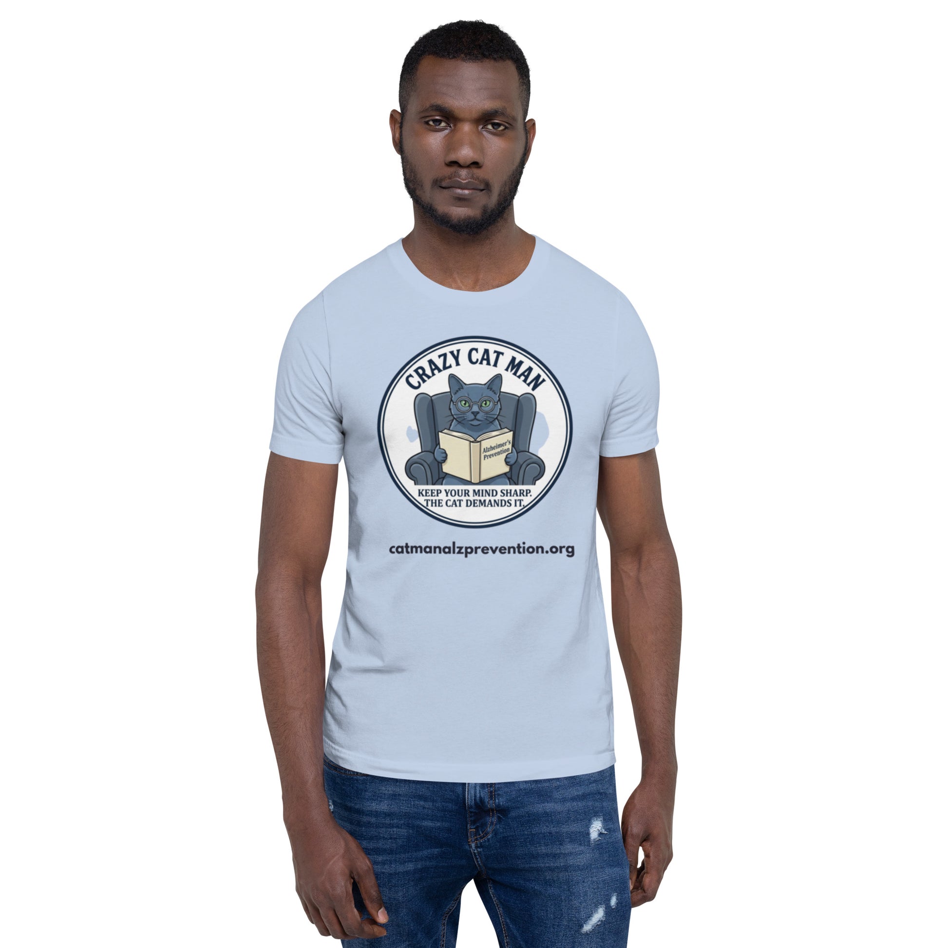 Man wearing a light blue t-shirt with a Crazy Cat Man Reading graphic