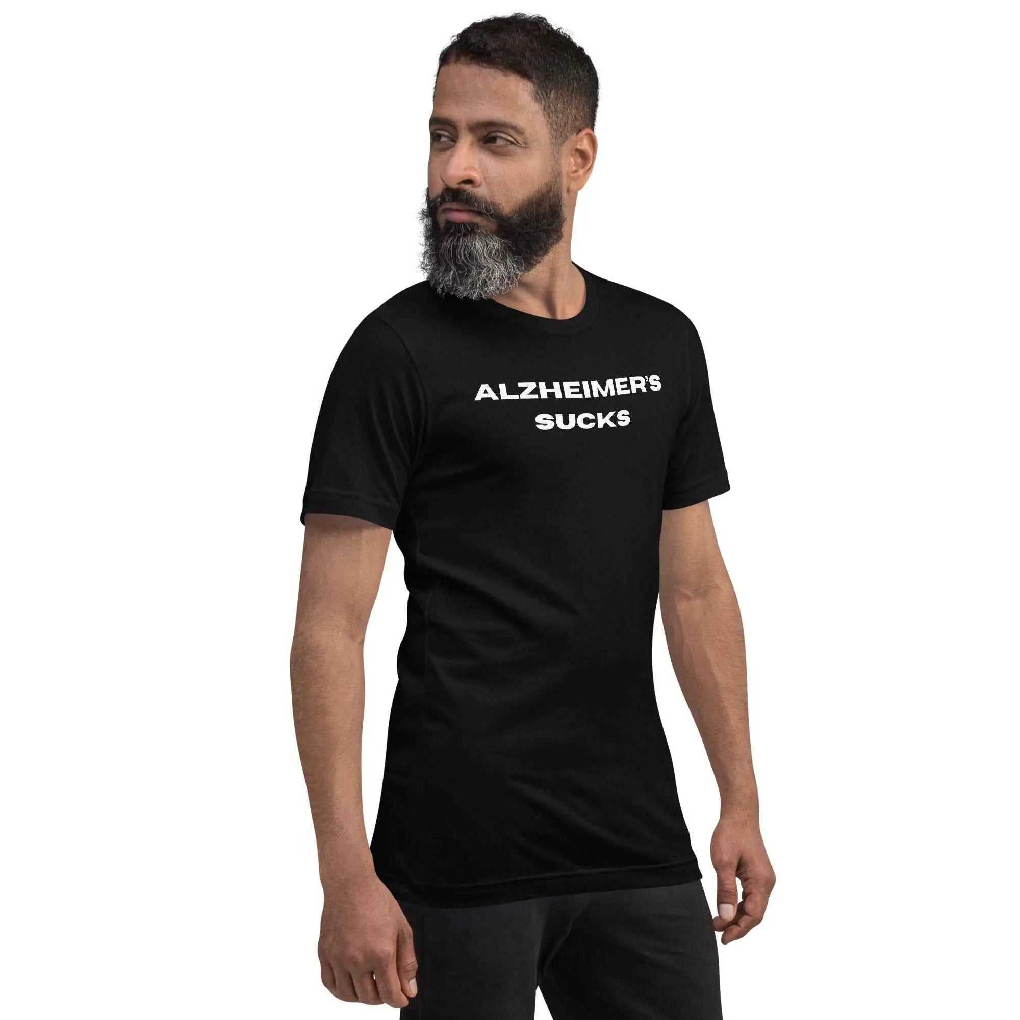 Man wearing a black Alzheimer's Sucks unisex t-shirt with white text