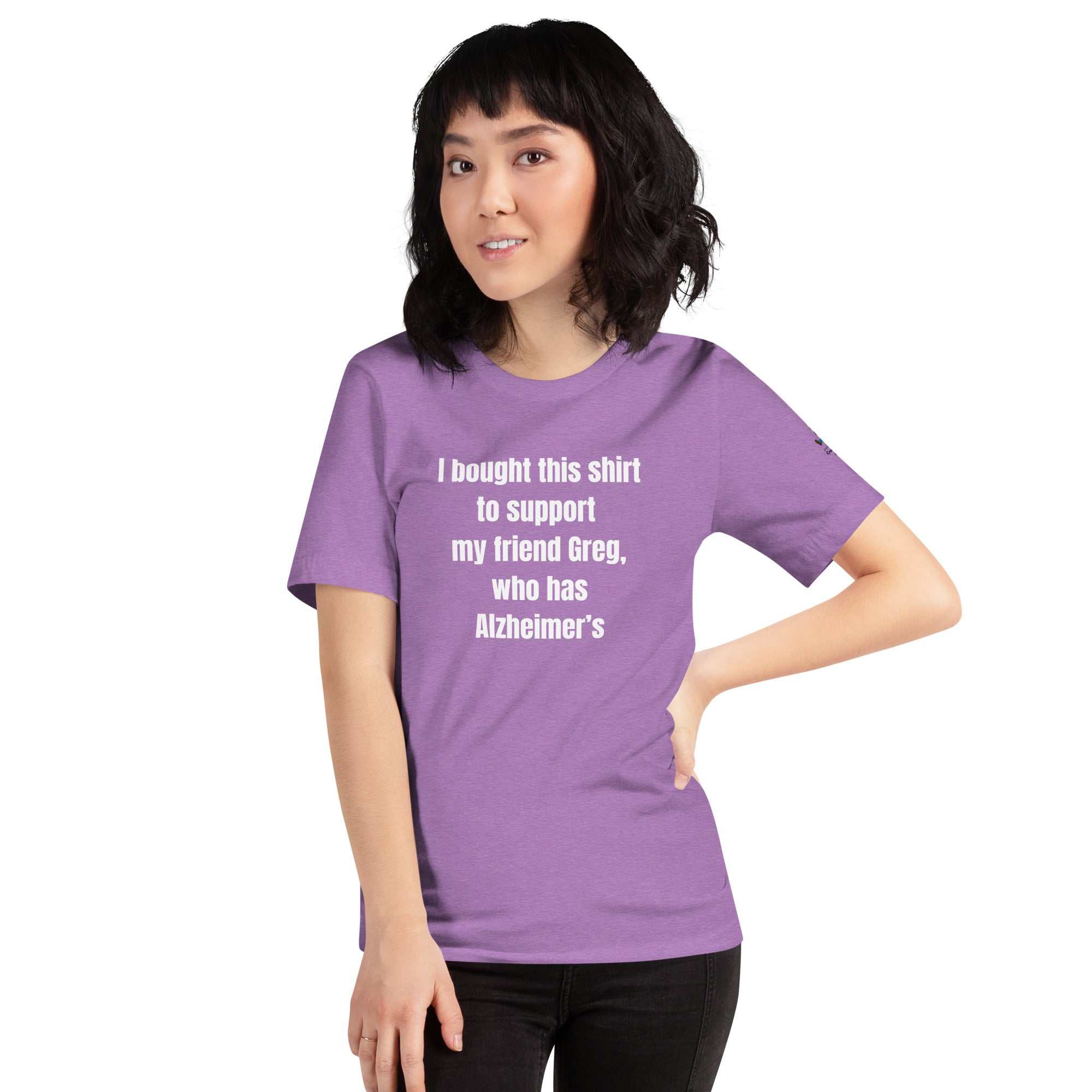 Person wearing a purple Direct and Distracted Alzheimer's Awareness t-shirt with white text