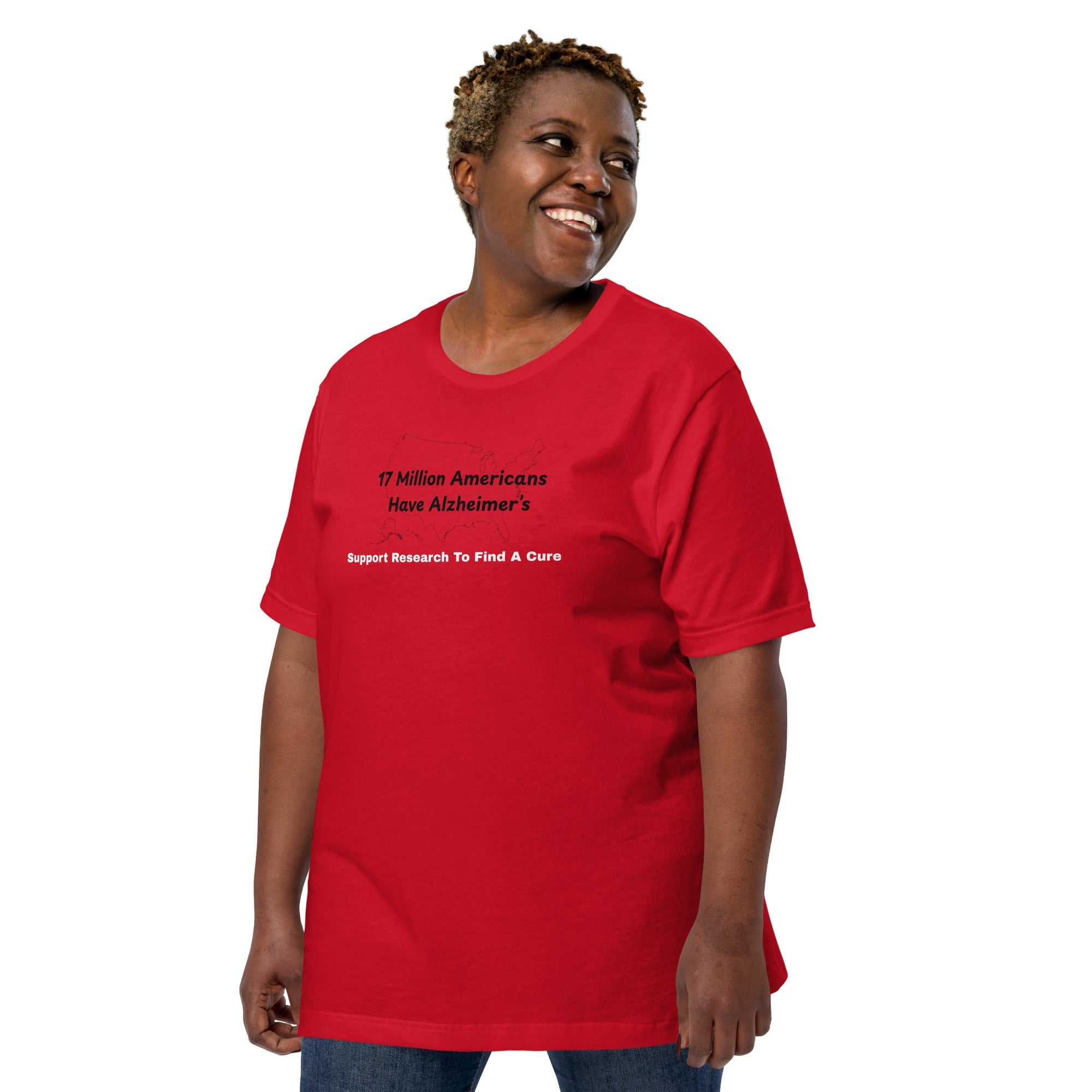 Person wearing a red unisex cotton t-shirt with Alzheimer's research support graphic