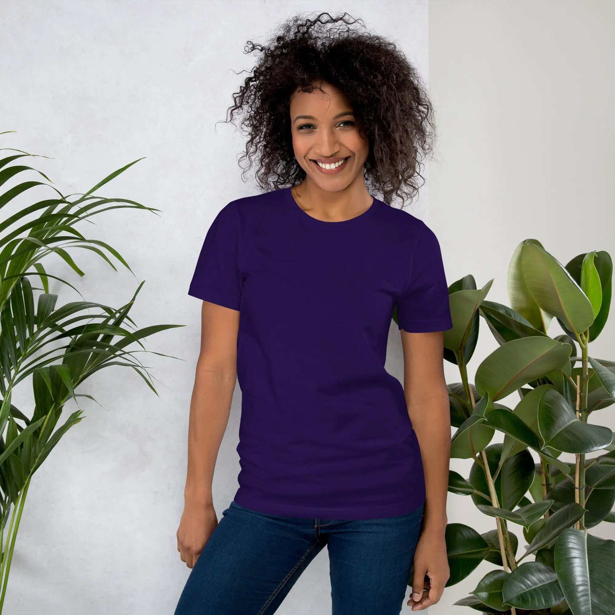 Person wearing a plain purple unisex t-shirt for Alzheimer's awareness