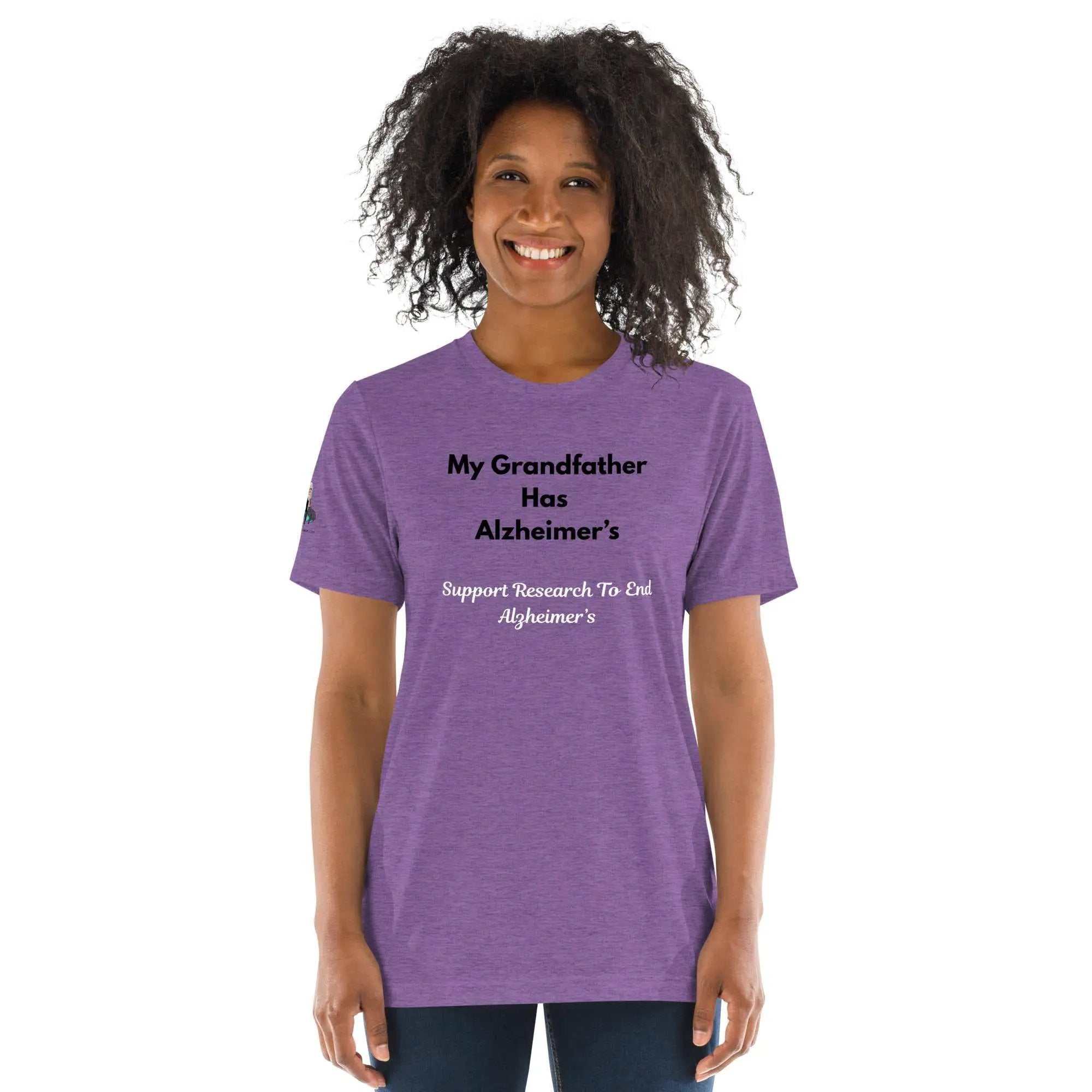 Purple unisex tri-blend T-shirt from Greg's AZ Store with Alzheimer's Awareness message and design on the front.