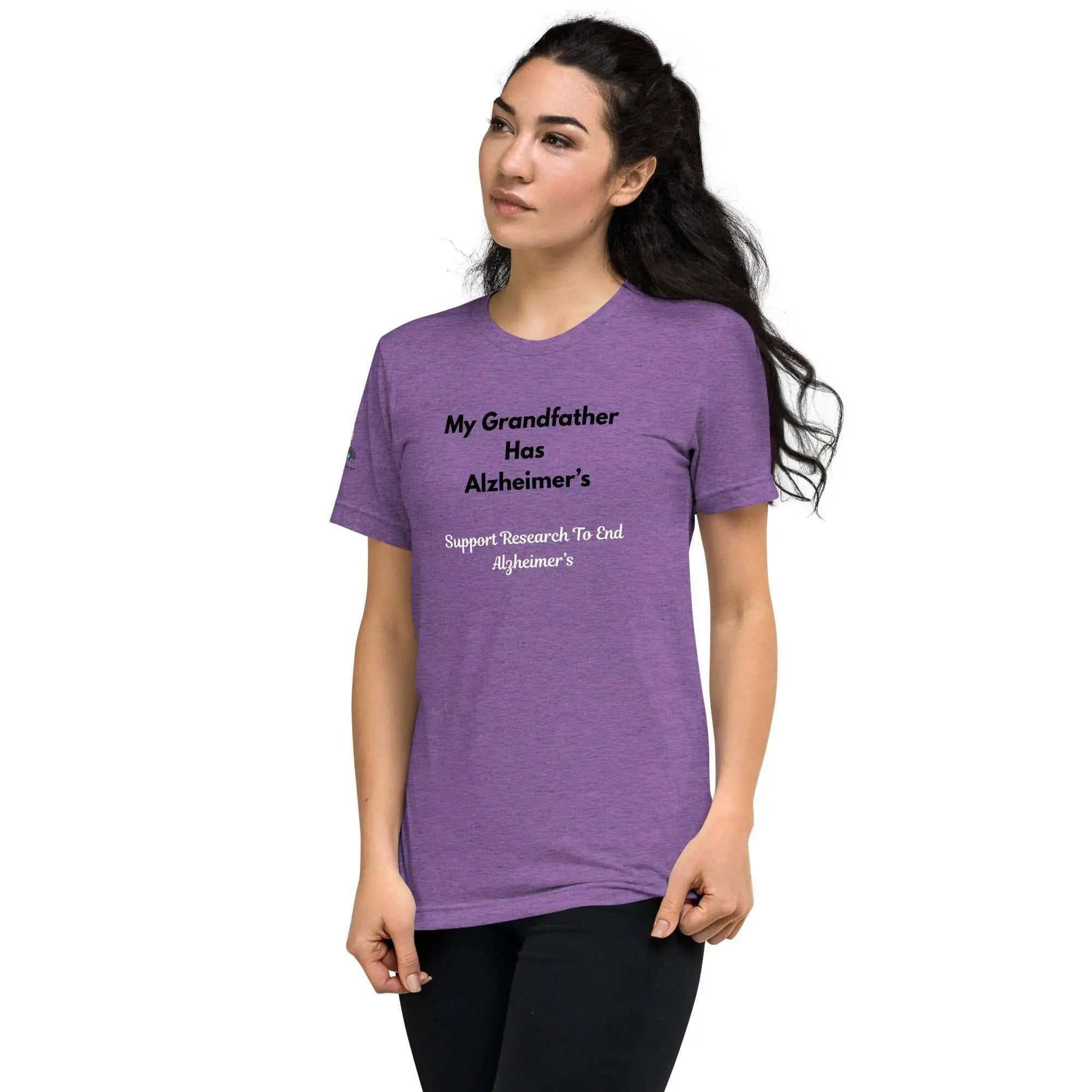 Woman wearing purple Alzheimer's awareness shirt with My Grandfather Has Alzheimer's text