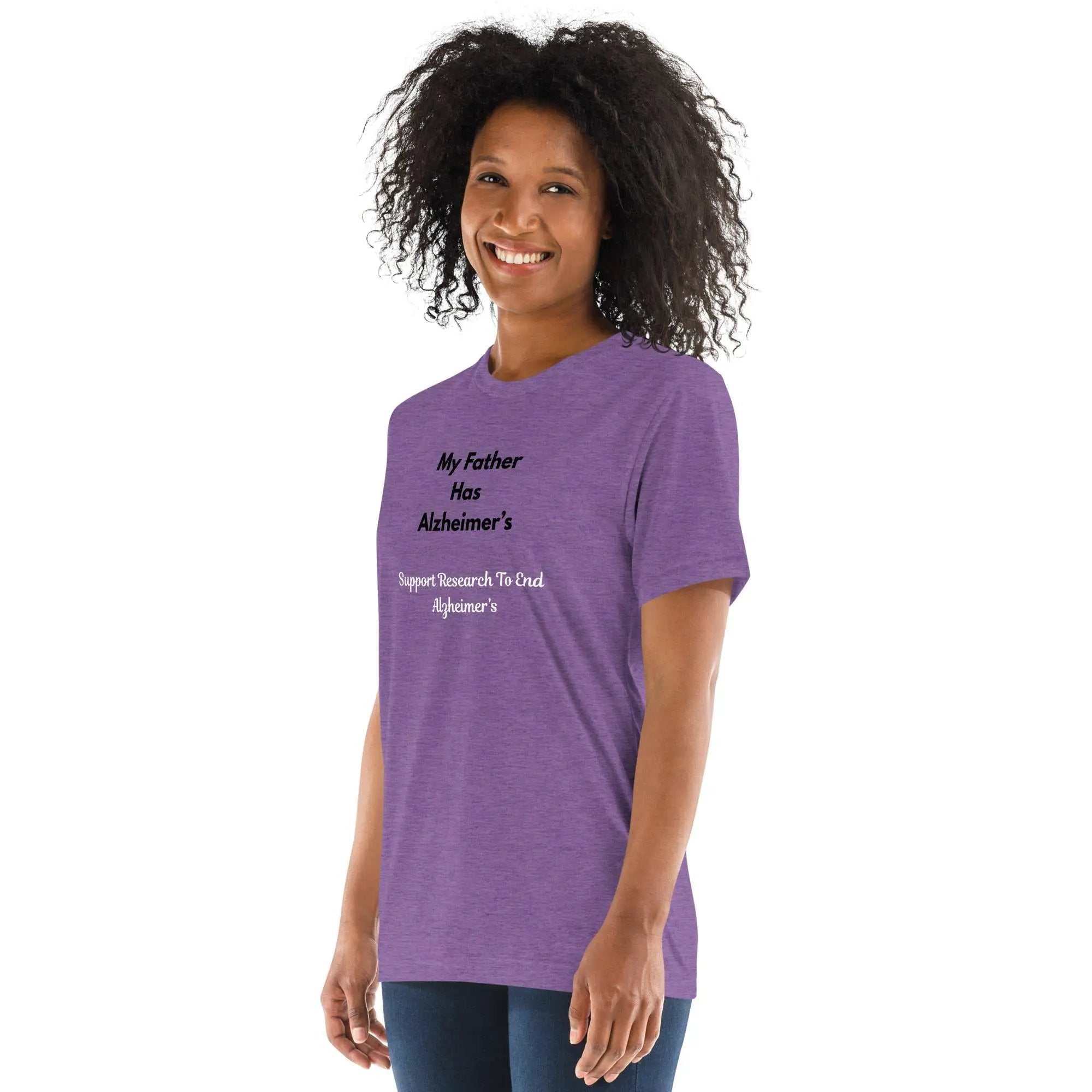 Woman wearing purple Alzheimer's awareness shirt with My Father Has Alzheimer's text
