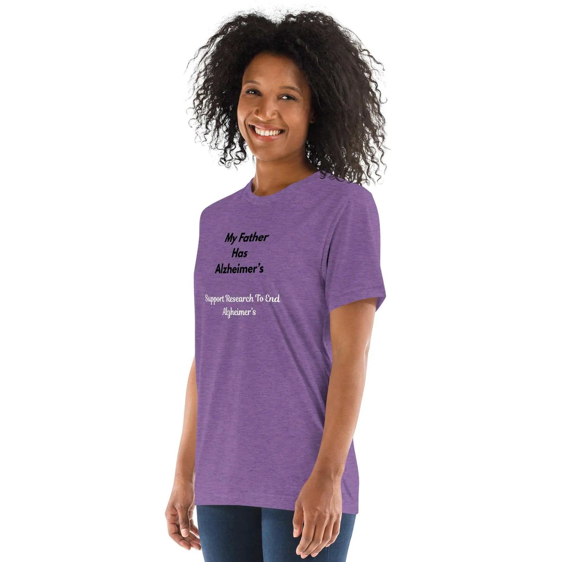 Purple unisex tri-blend T-shirt from Greg's AZ Store with Alzheimer's Awareness message and left-front print.