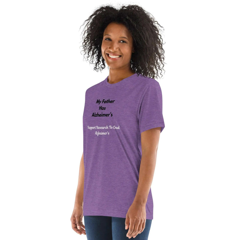 Purple unisex tri-blend T-shirt from Greg's AZ Store with Alzheimer's Awareness message and left-front print.