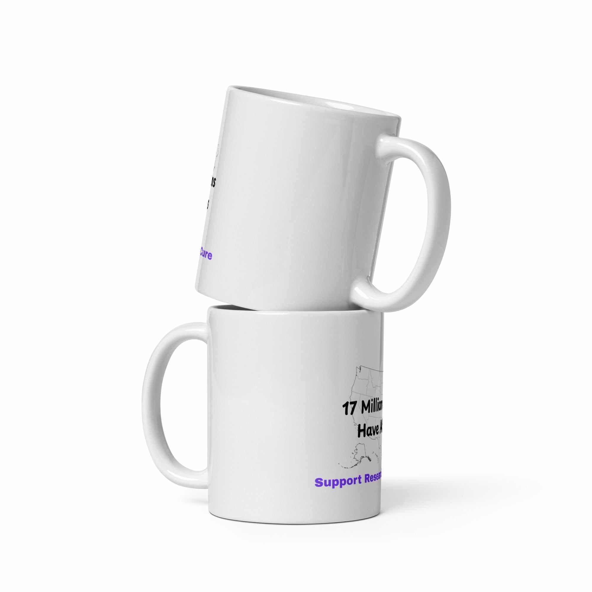 Two white glossy Alzheimer awareness mugs stacked with map graphic and text
