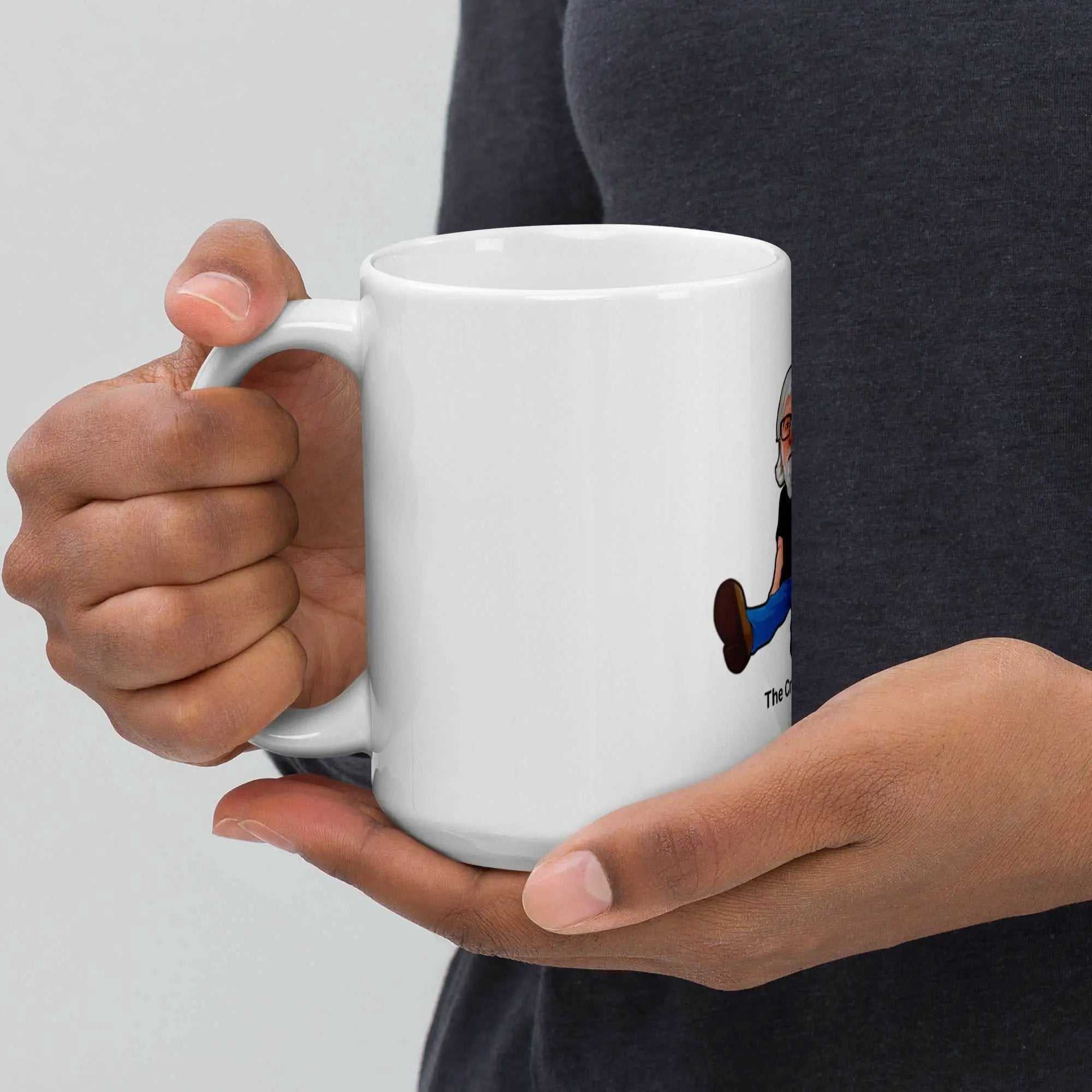 The Cat Man signature white glossy mug held in hands