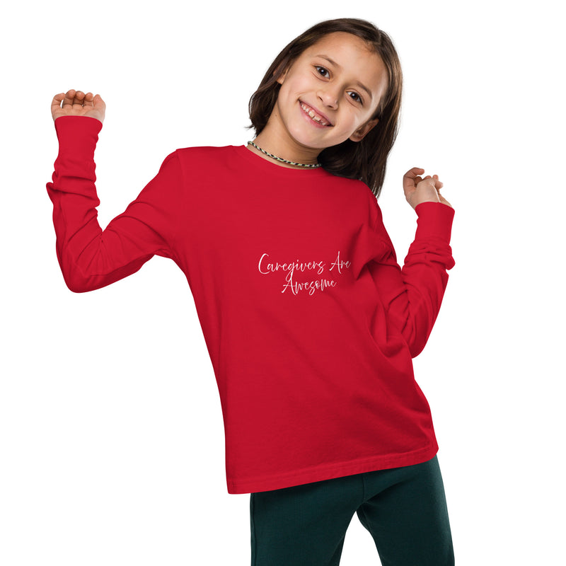 Youth wearing a red long sleeve tee with white graphics stating 'Caregivers Are Awesome.' Classic crew neck and ribbed cuffs.
